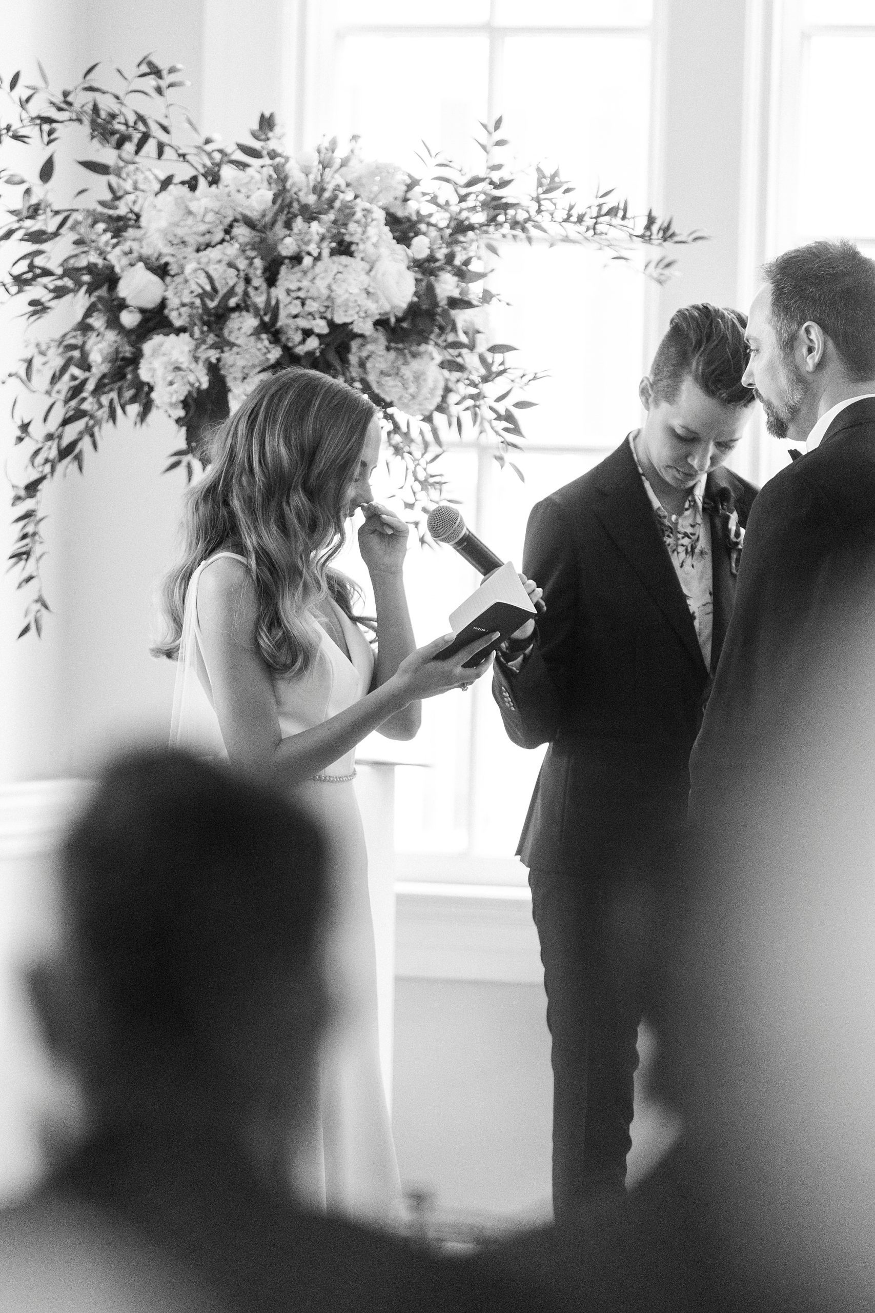 bride cries reading vows during NC wedding ceremony