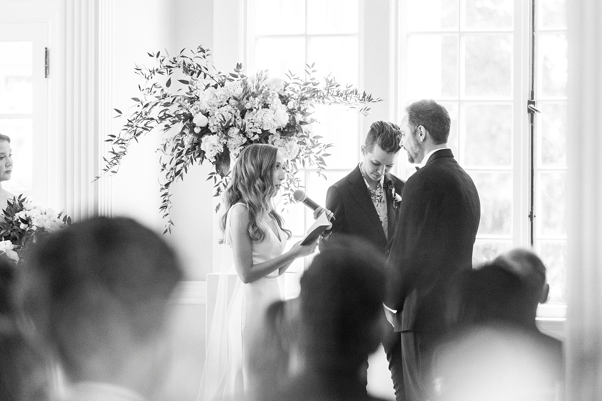bride reads vows during wedding ceremony