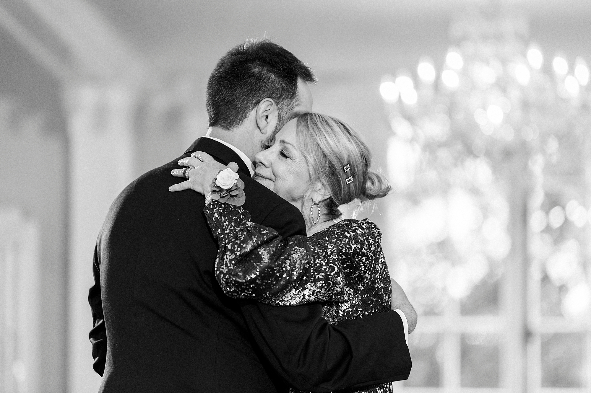 mom hugs groom during dance at Gastonia NC reception