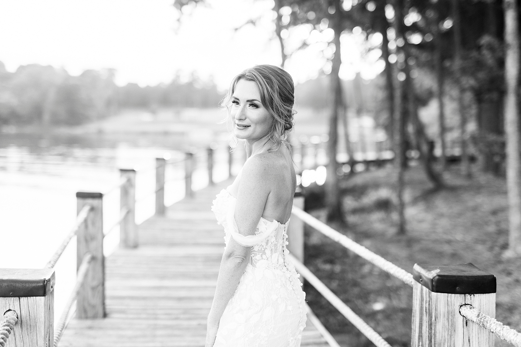 bride-to-be looks over shoulder during portraits at Trump National Golf Club