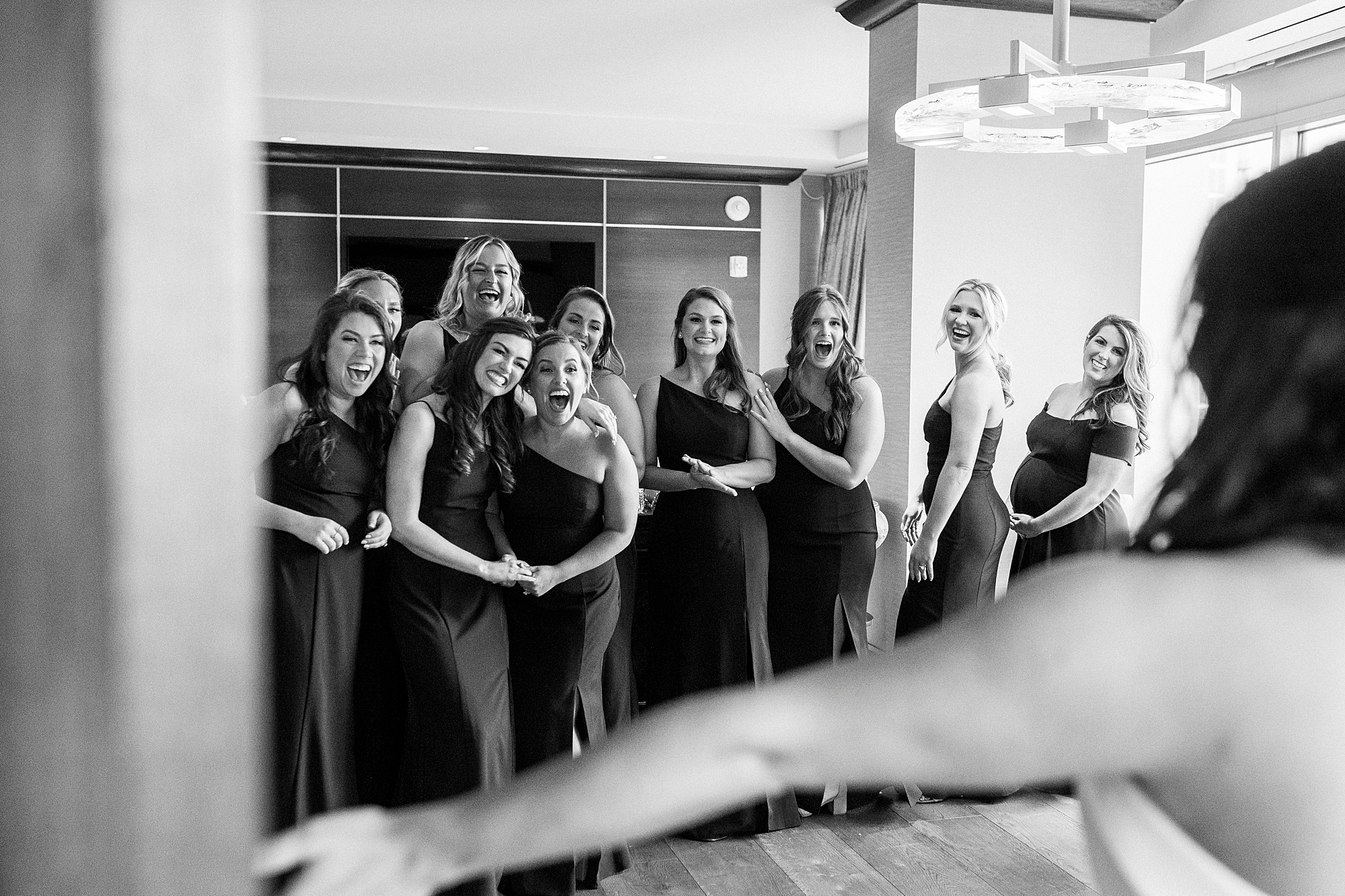 bride has first look with bridesmaids at Kimpton Tyron Park