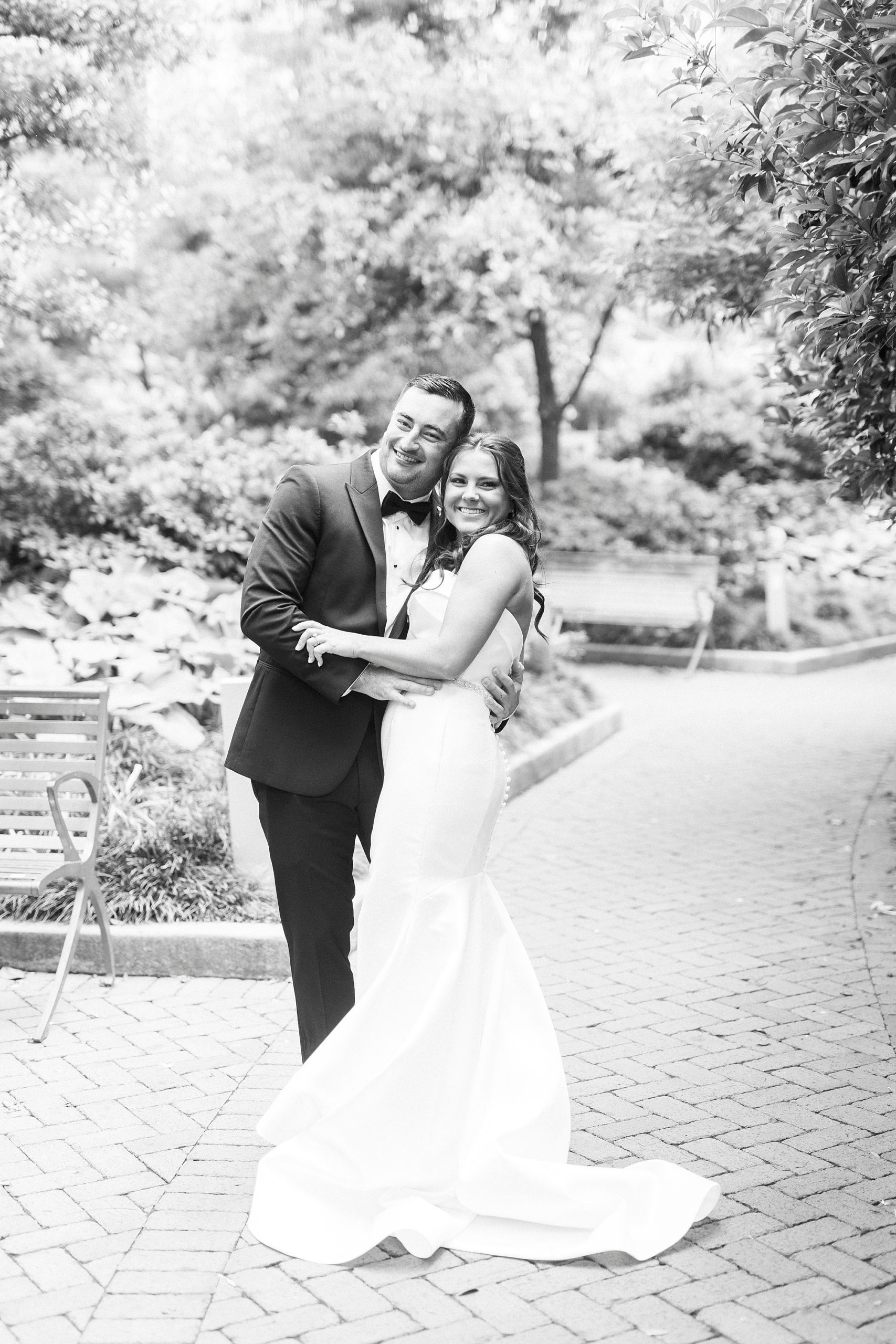 bride and groom hug during first look for Charlotte wedding day