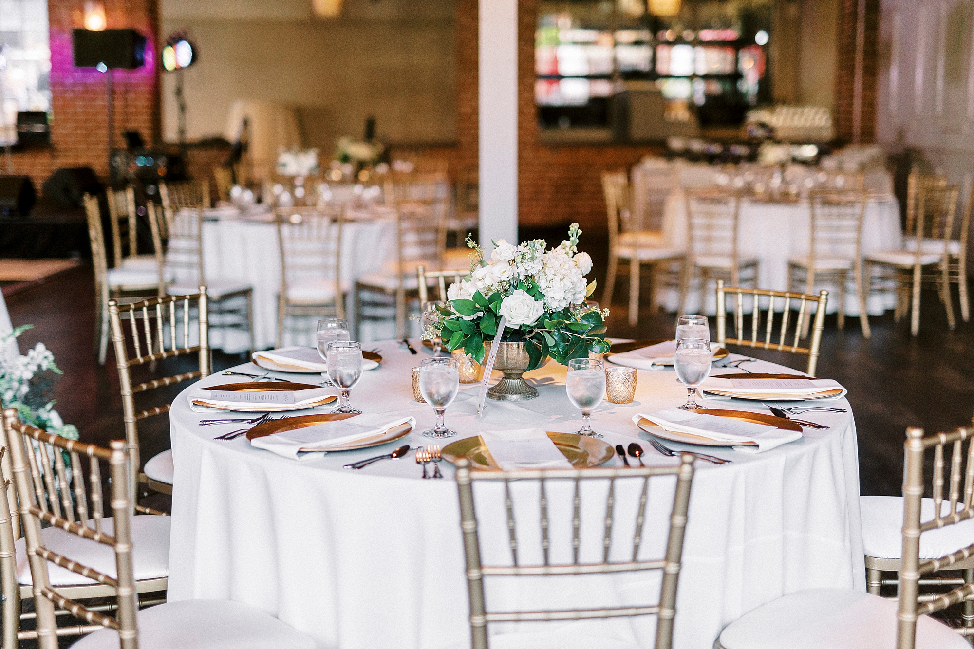 classic Byron's South End wedding reception with gold and ivory details