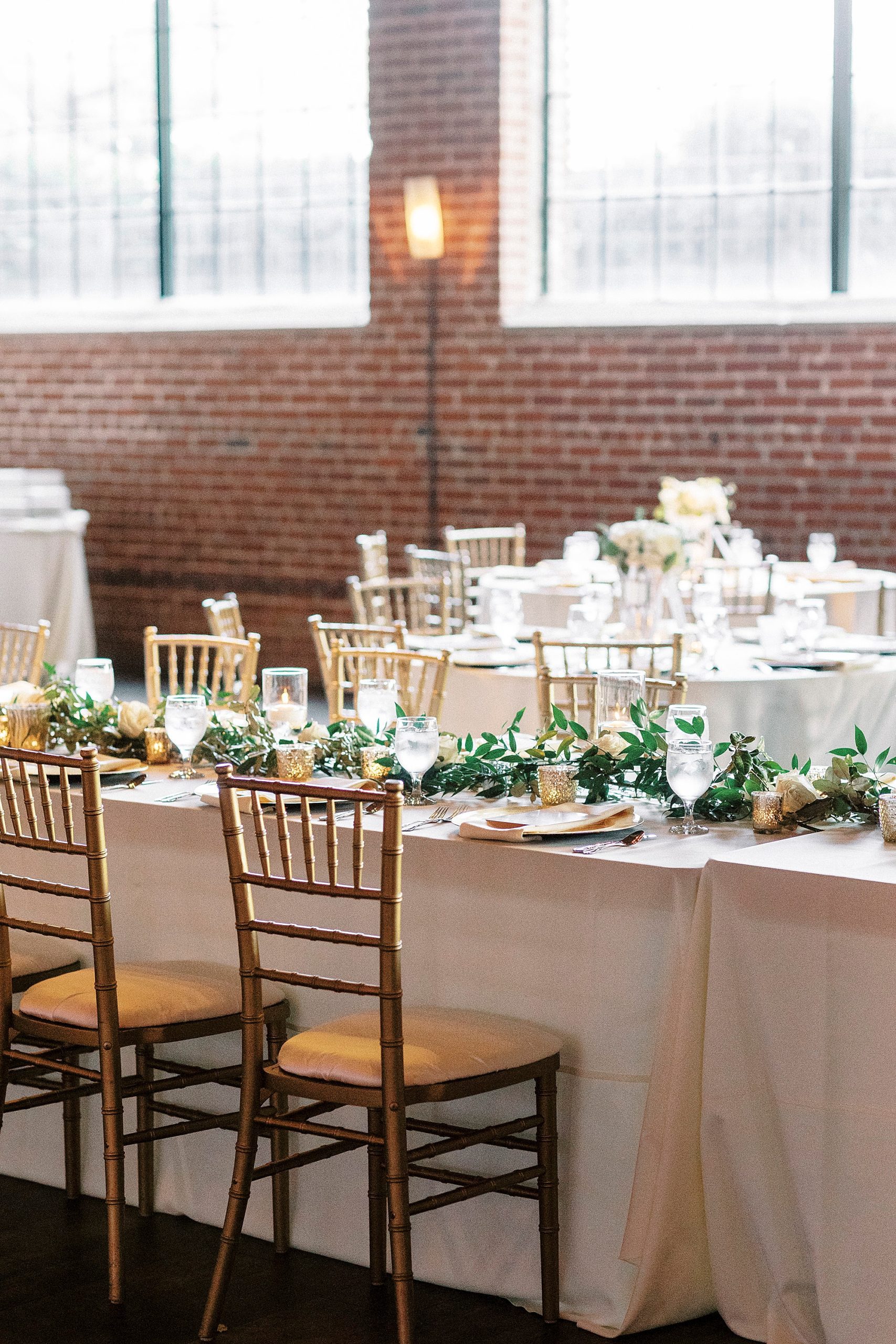 Byron's South End wedding reception with gold and ivory details