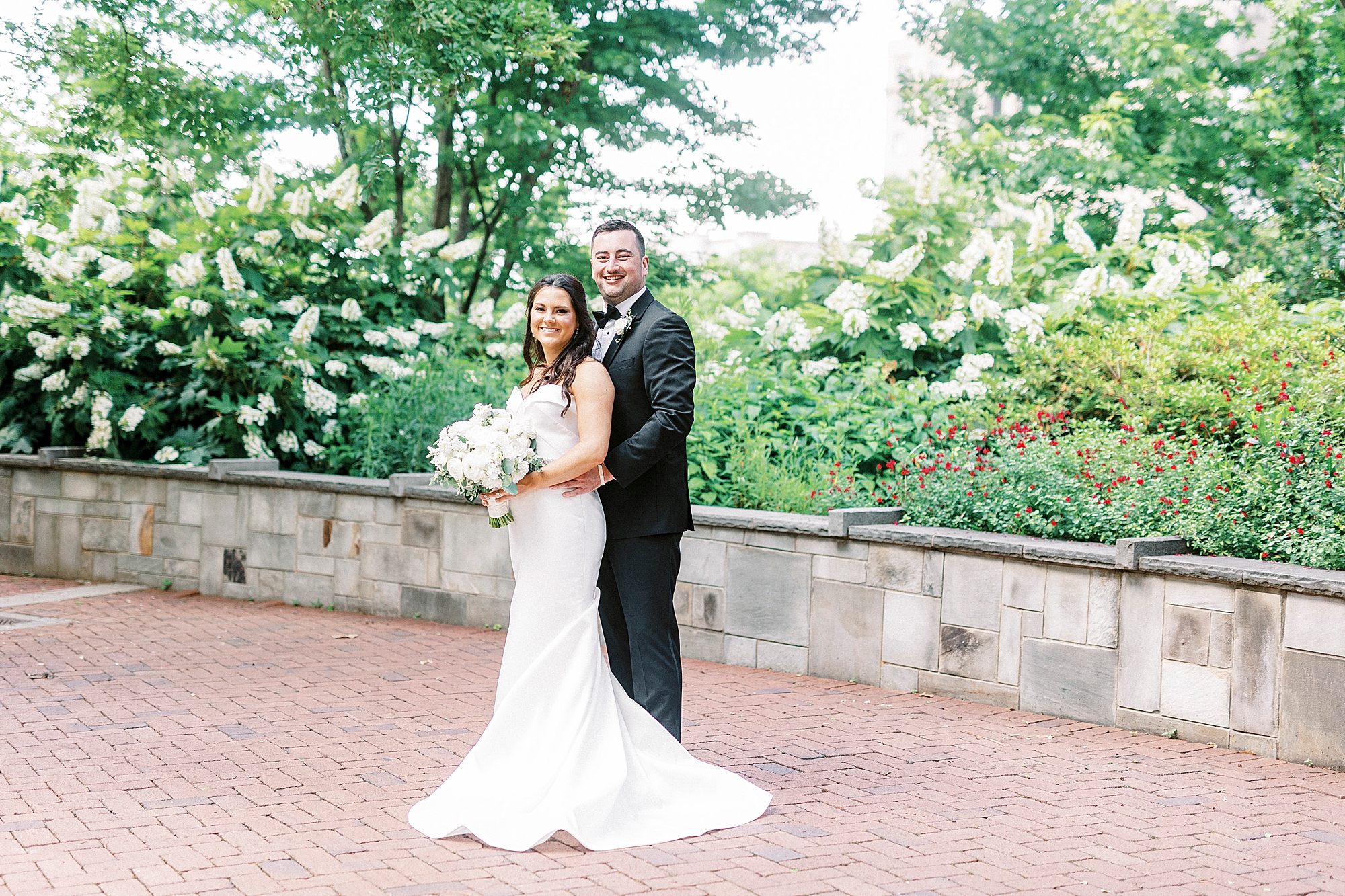 couple hugs in Charlotte NC wedding park