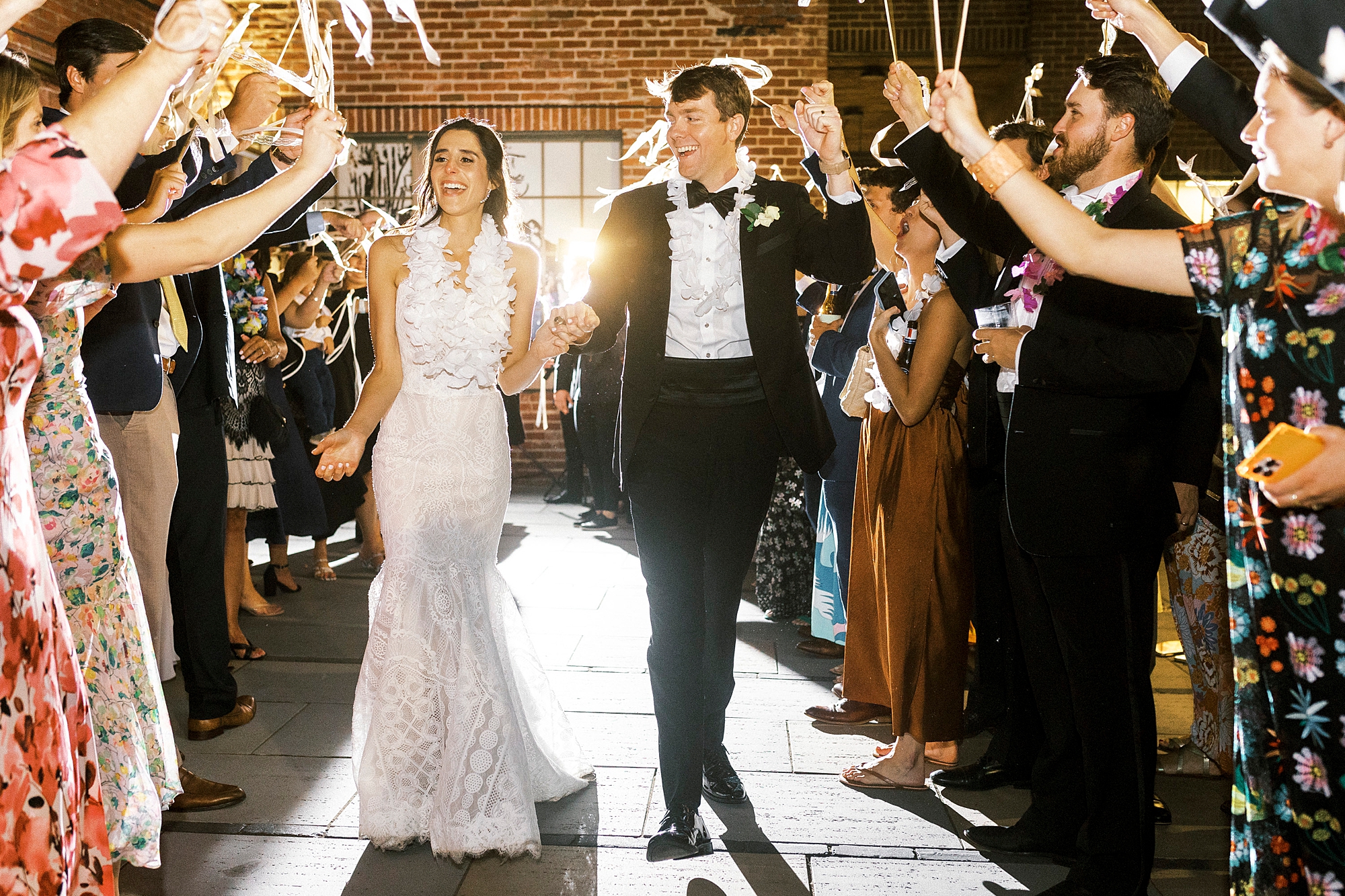 newlyweds leave wedding reception in sparkler exit from Byron's South End