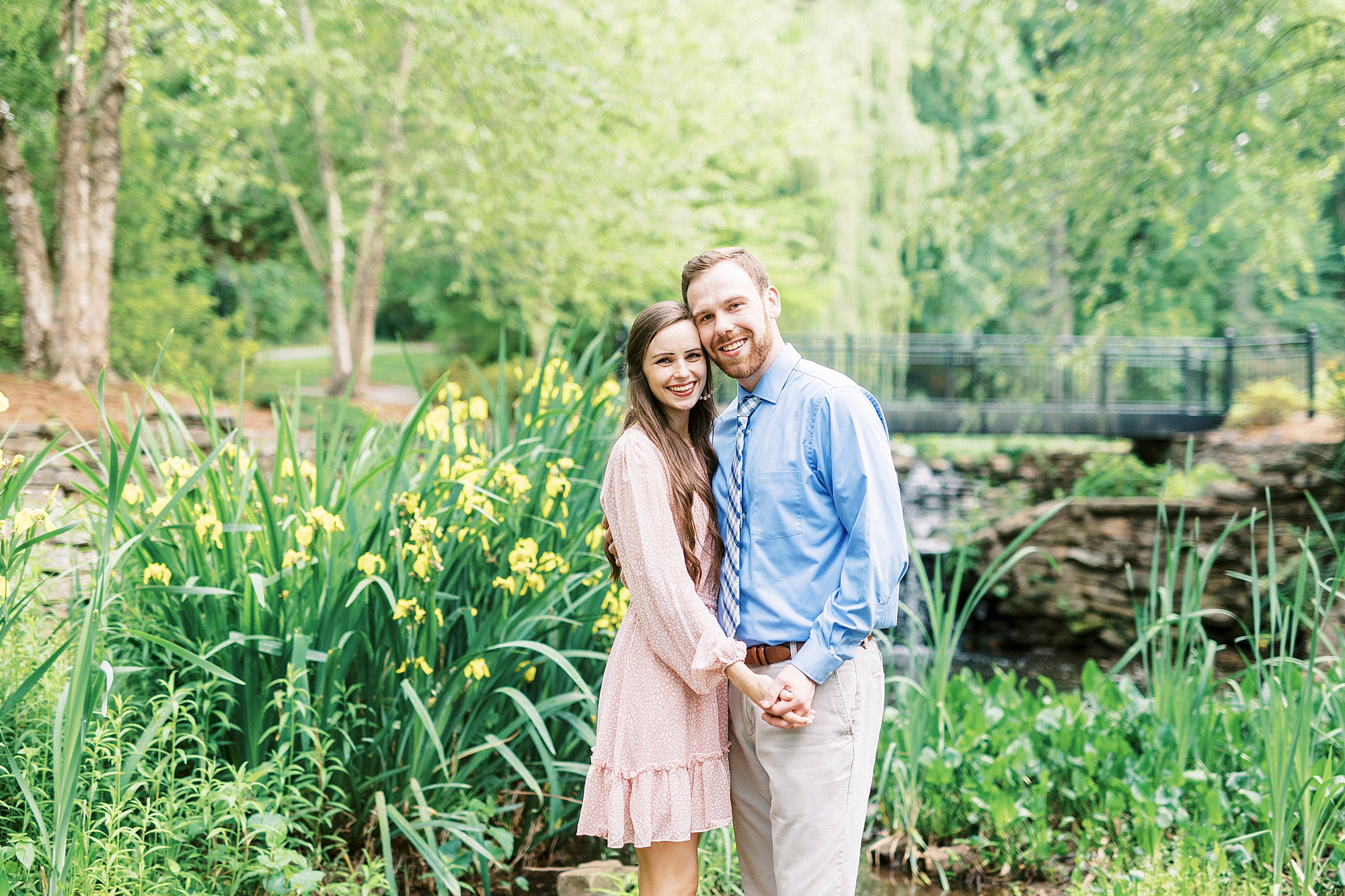 bride and groom hug standing in Glencairn Gardens