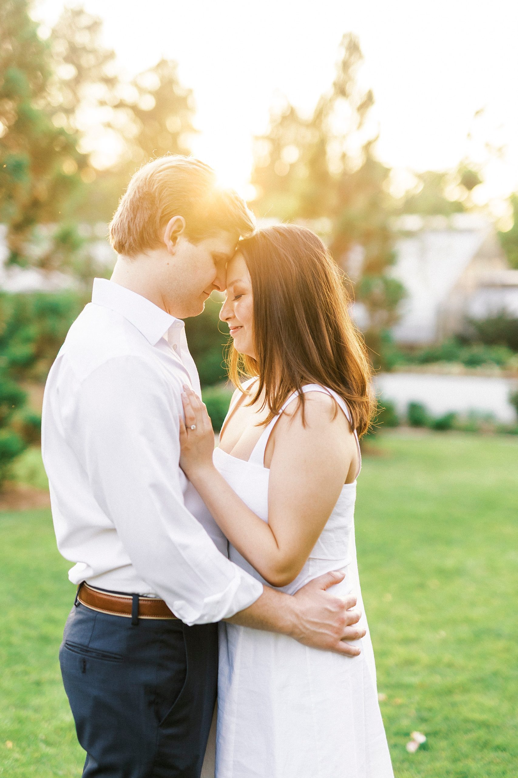 sunset Reynolda Gardens engagement portraits on lawn