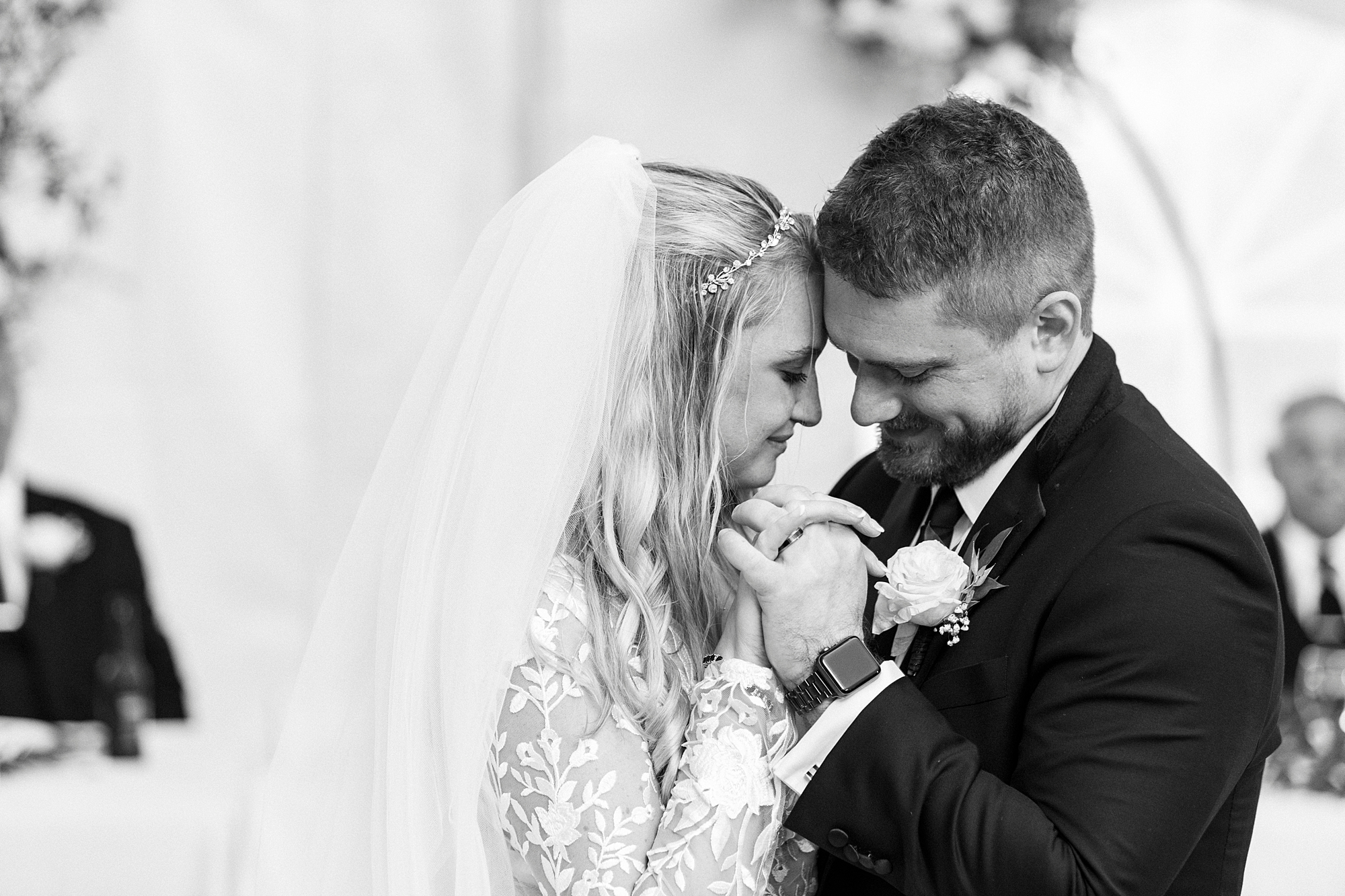 newlyweds dance holding each other during Blowing Rock NC wedding reception