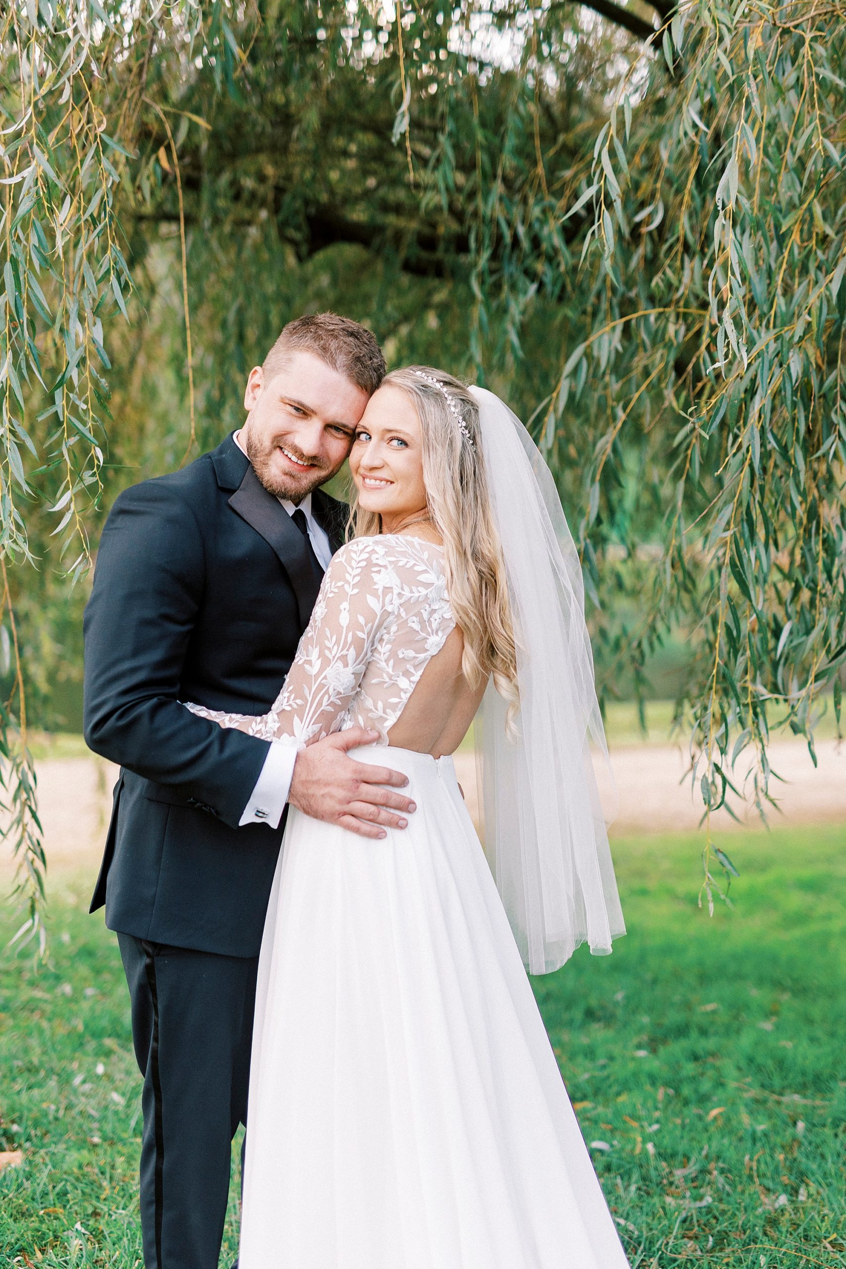 bride and groom hug during NC wedding day