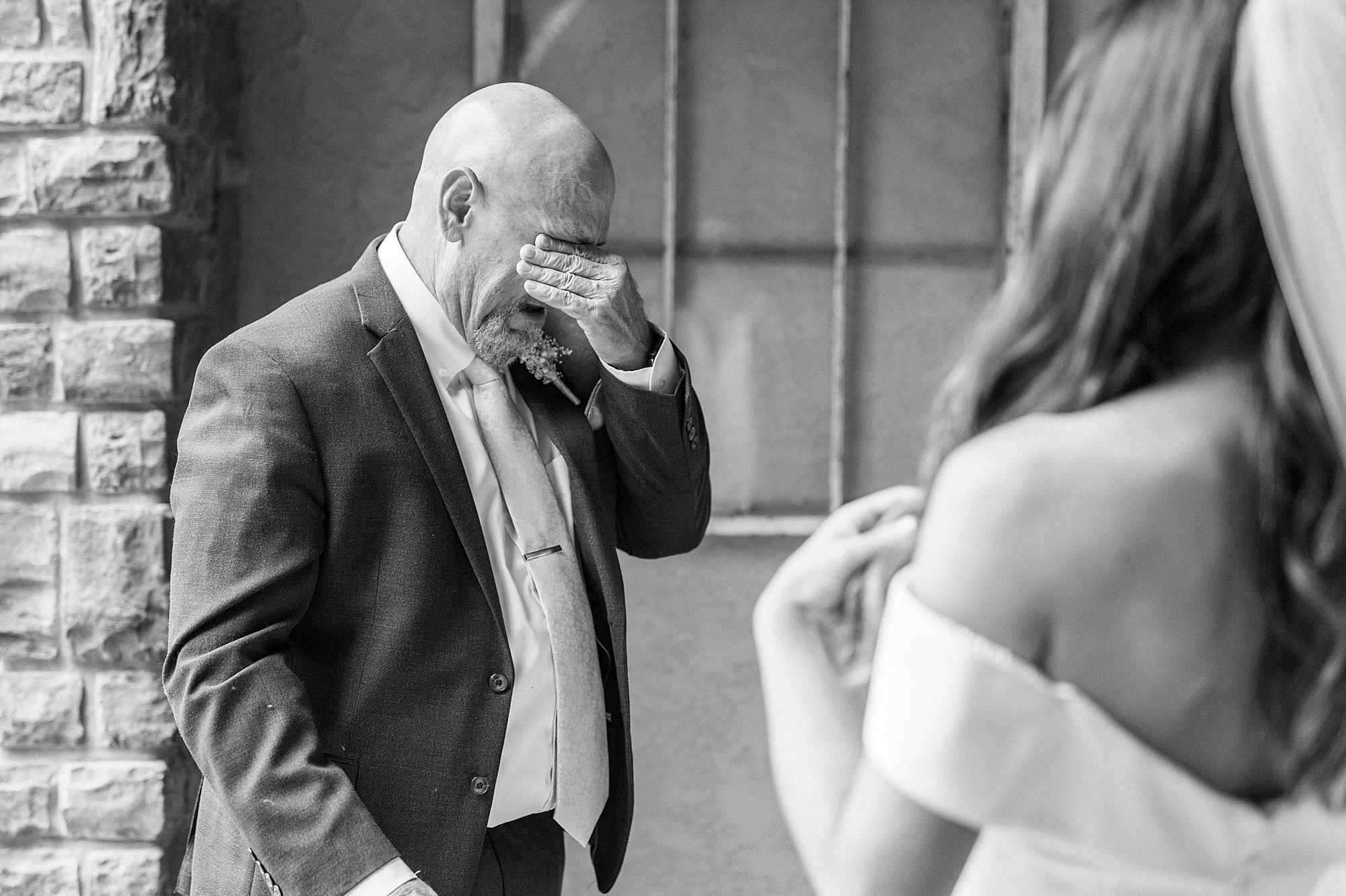 father of bride cries during first look with daughter