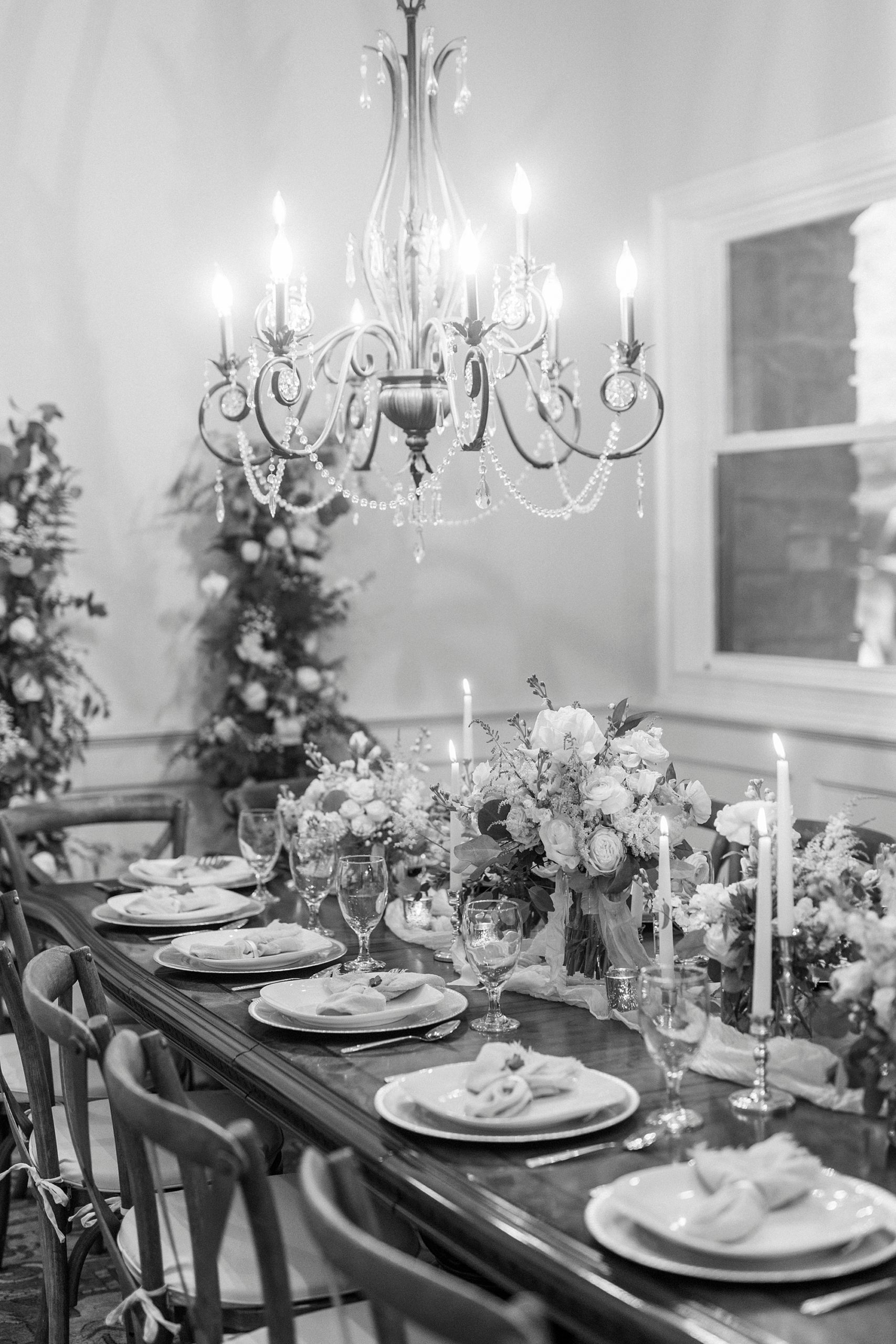 wedding reception with family style dinner and pink and gold details