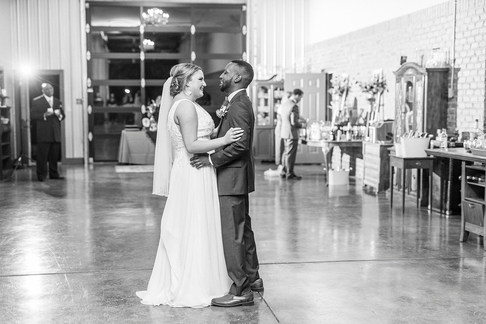 bride and groom dance during wedding reception at Bella Terra Inc.