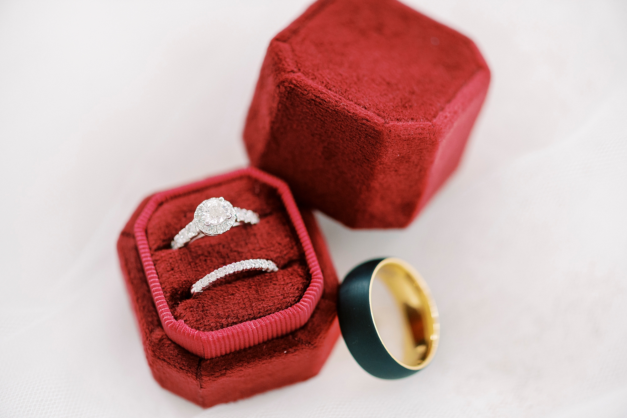 wedding rings in red ring box