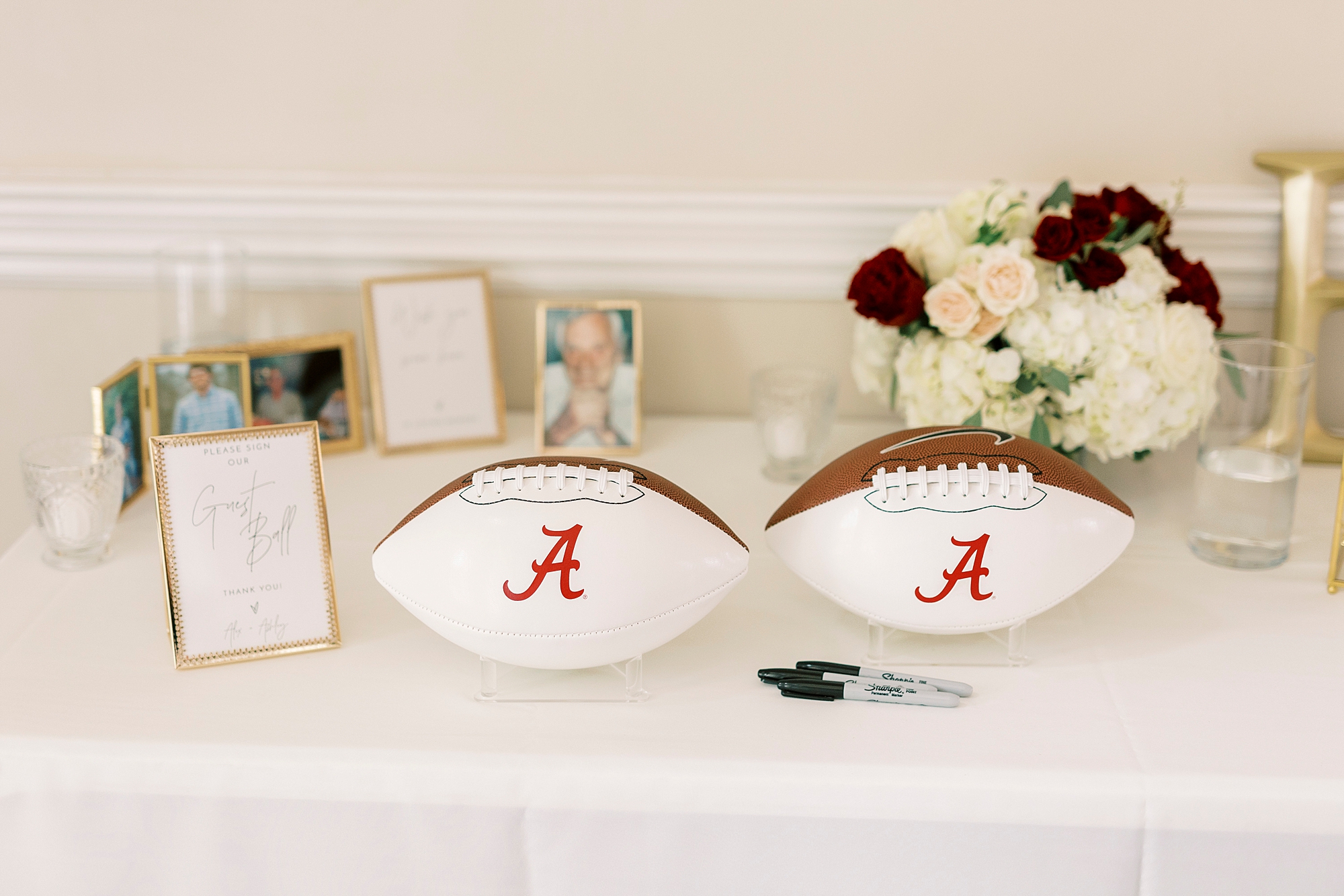 footballs with Alabama logo for guest book