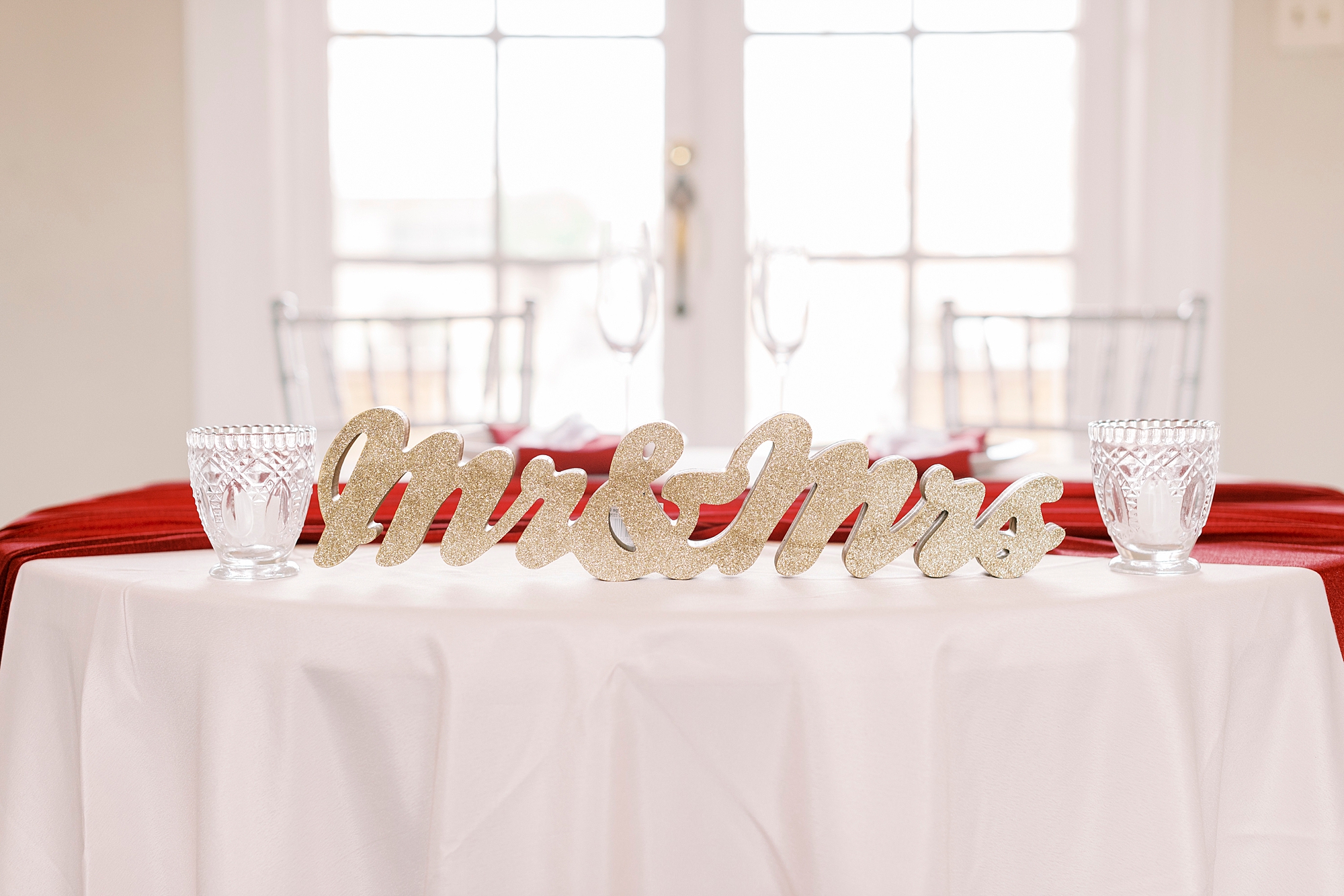 gold Mr and mrs sign on table for fall wedding at Separk Mansion reception