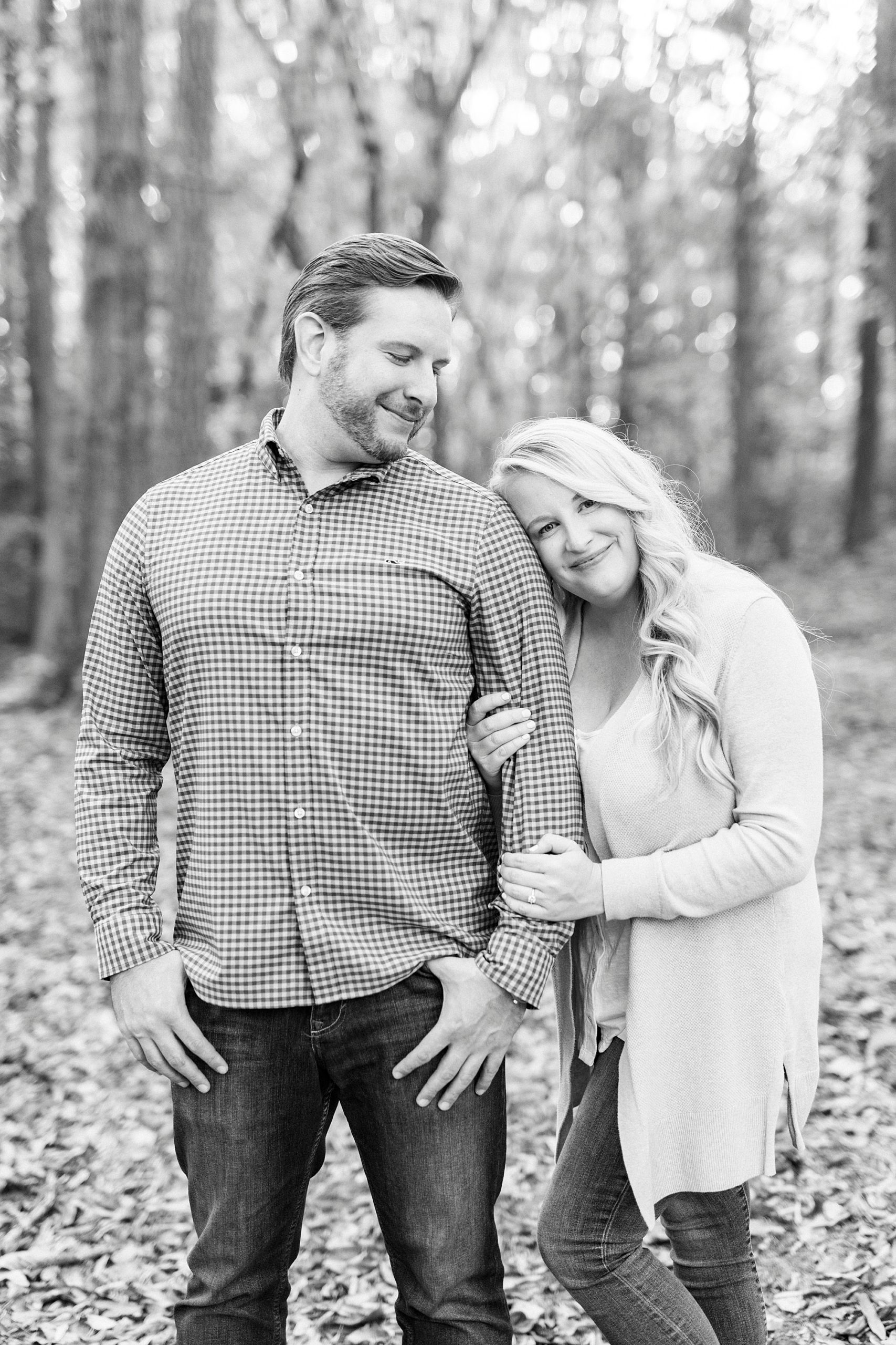 bride leans on groom's shoulder at Latta Nature Preserve