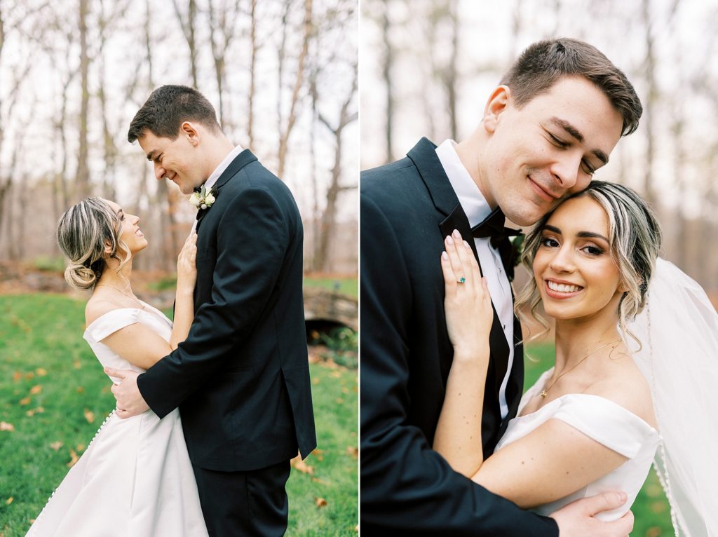 bride and groom hug on lawn during fall wedding 