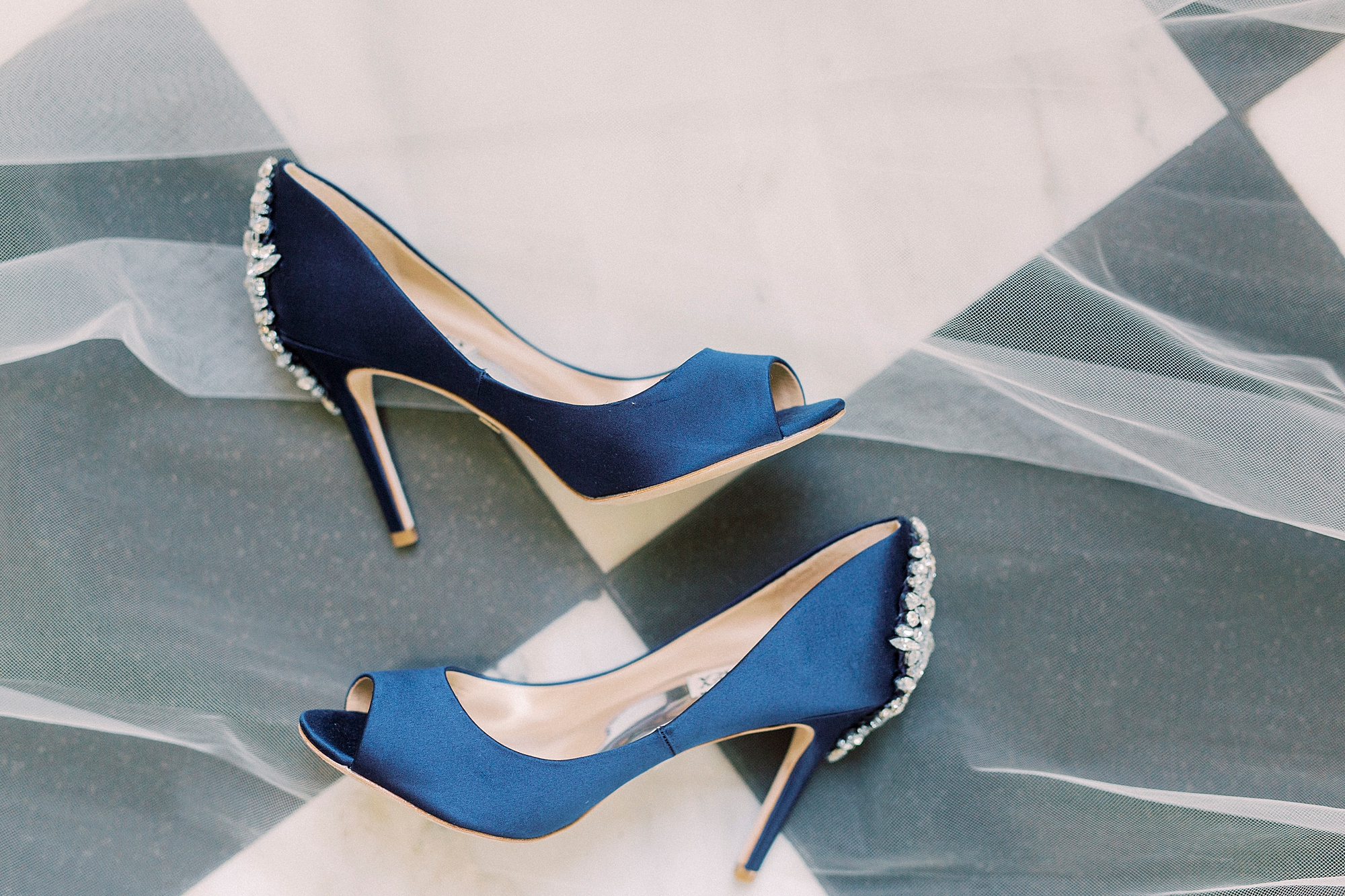 blue shoes with jeweled back