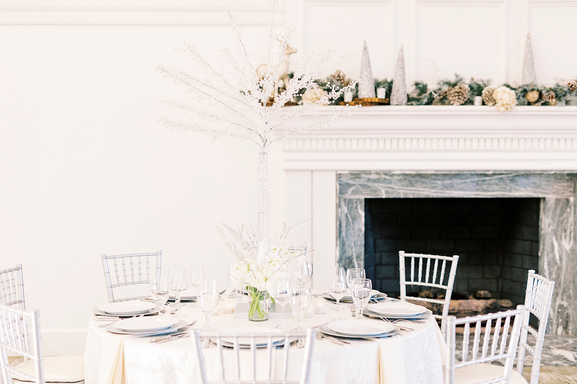 Winter Wonderland wedding at River Run Country Club with white and blue accents