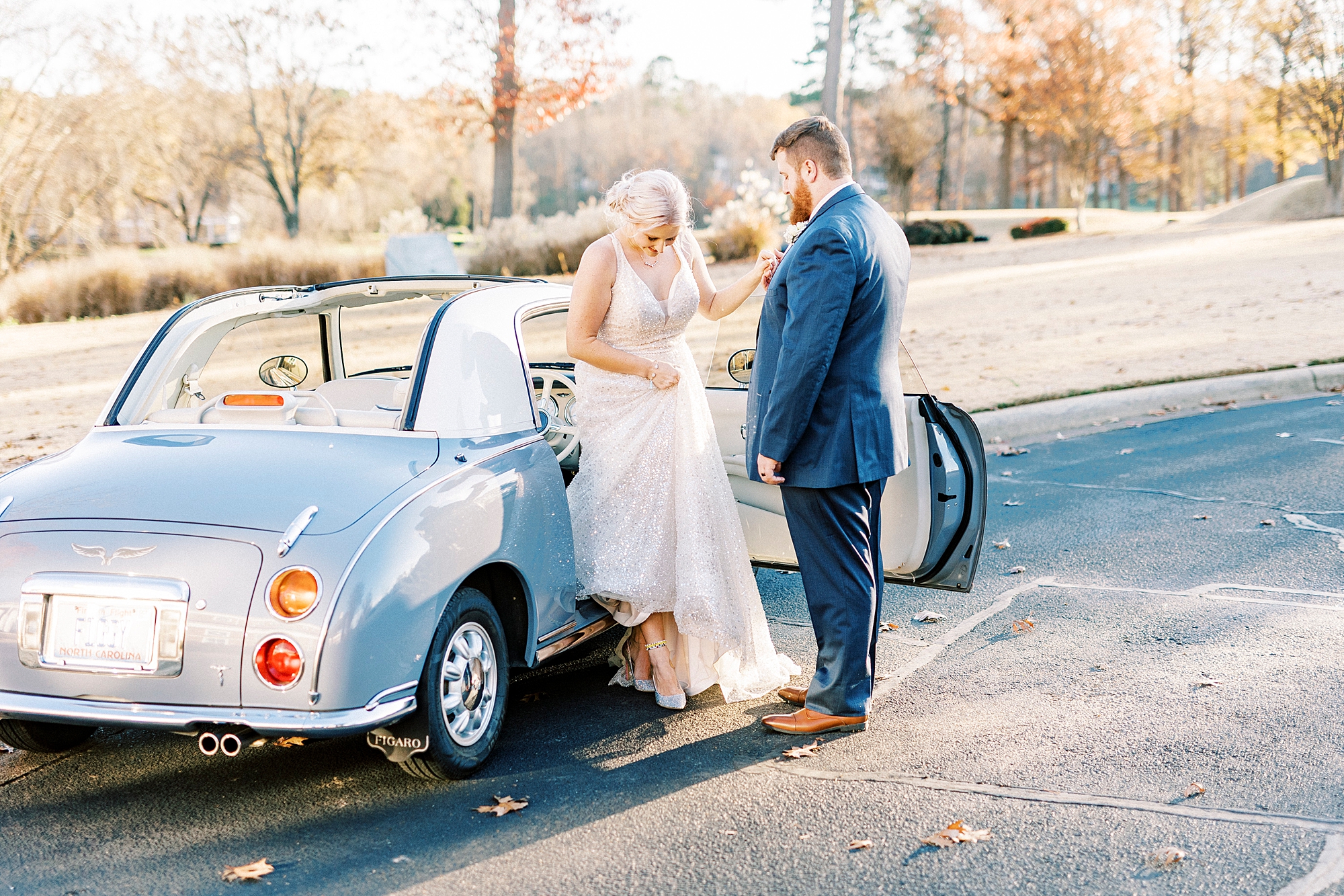 groom helps bride out of Charlotte the Figgy