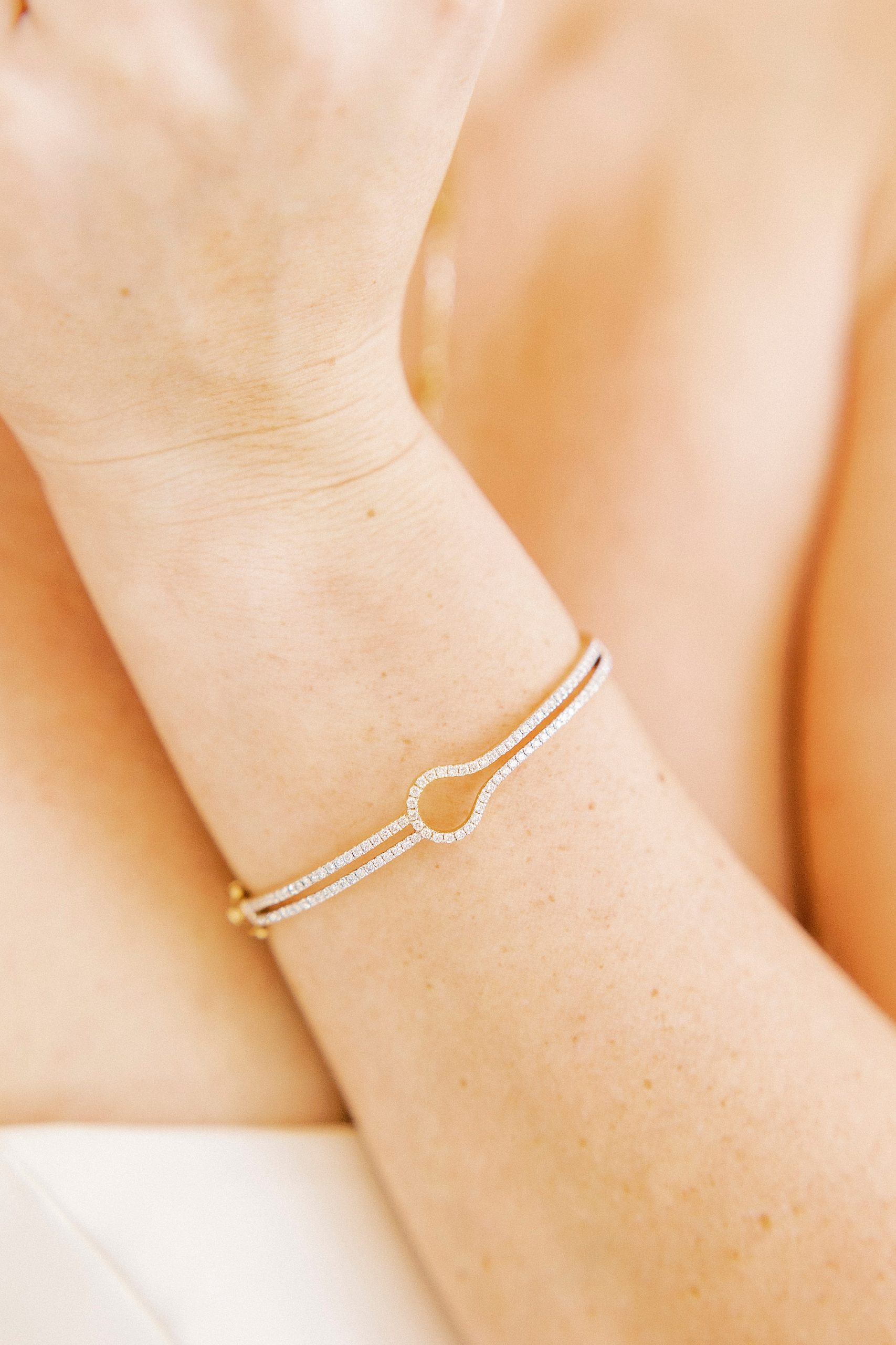 gold bracelet for bride during winter wedding