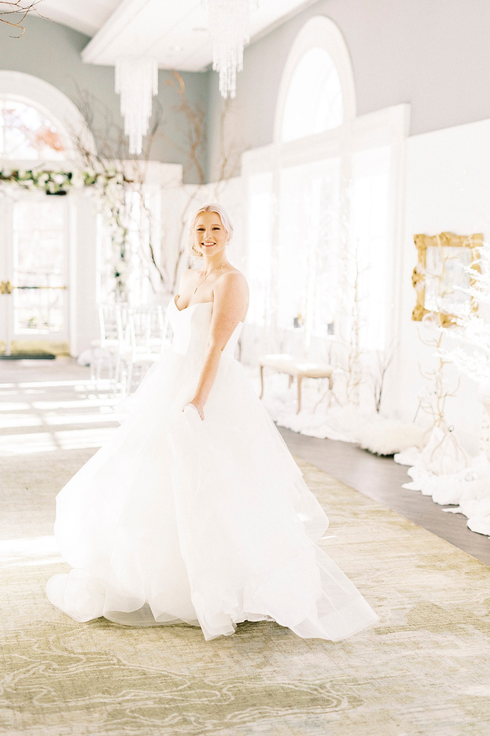 bride twirls in wedding gown at River Run Country Club
