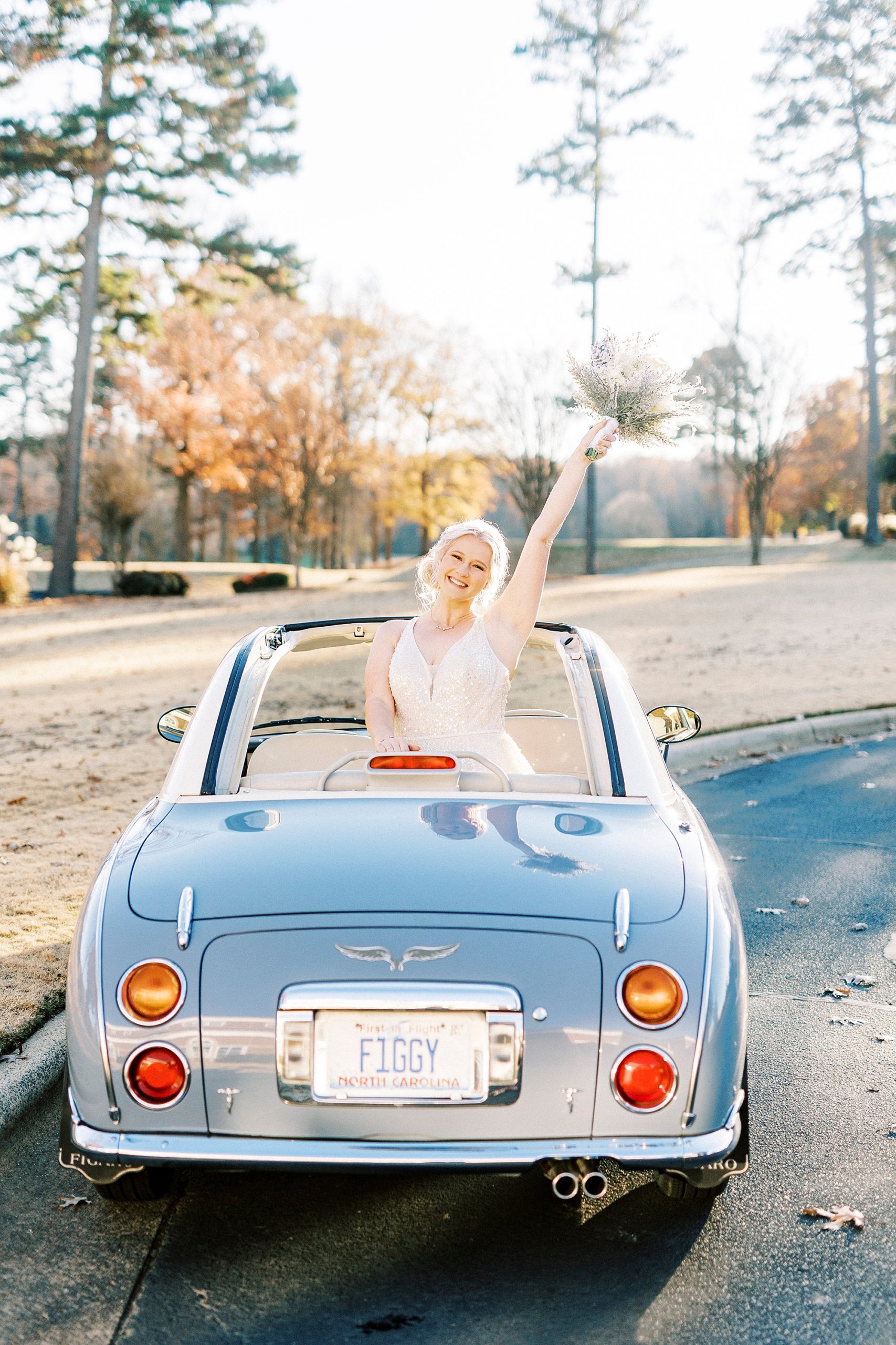 bride poses in Charlotte the Figgy waving