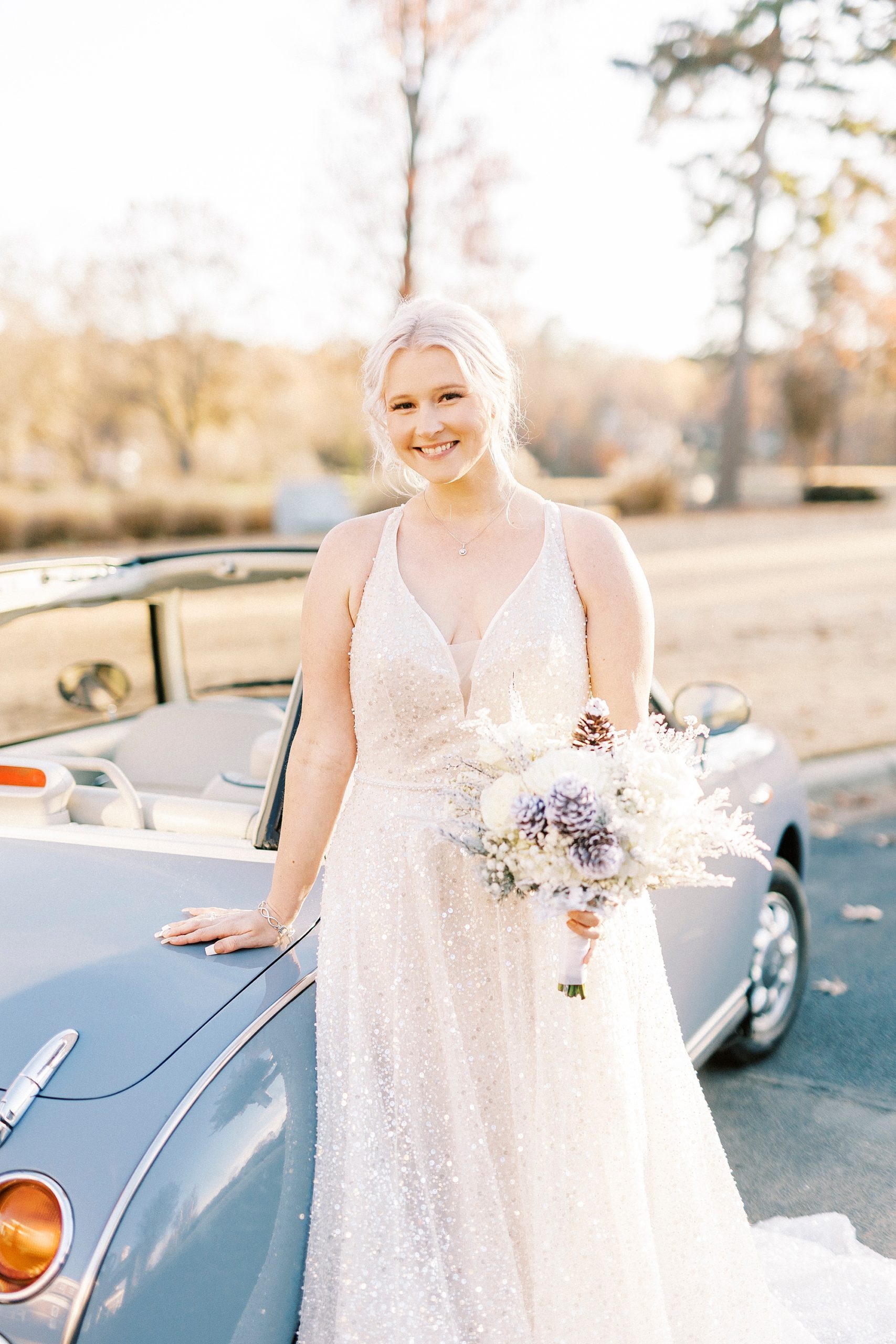 bride leans on hood of Charlotte the Figgy