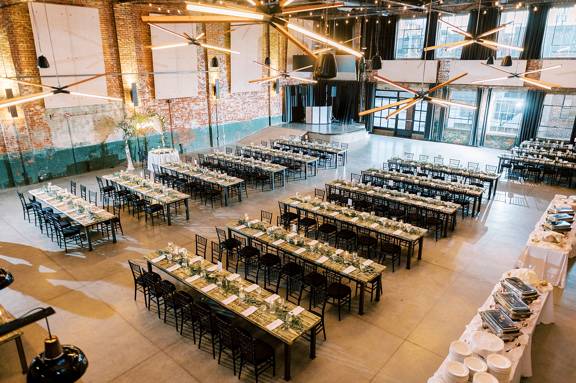 family style seating for wedding reception at the Cadillac Service Garage