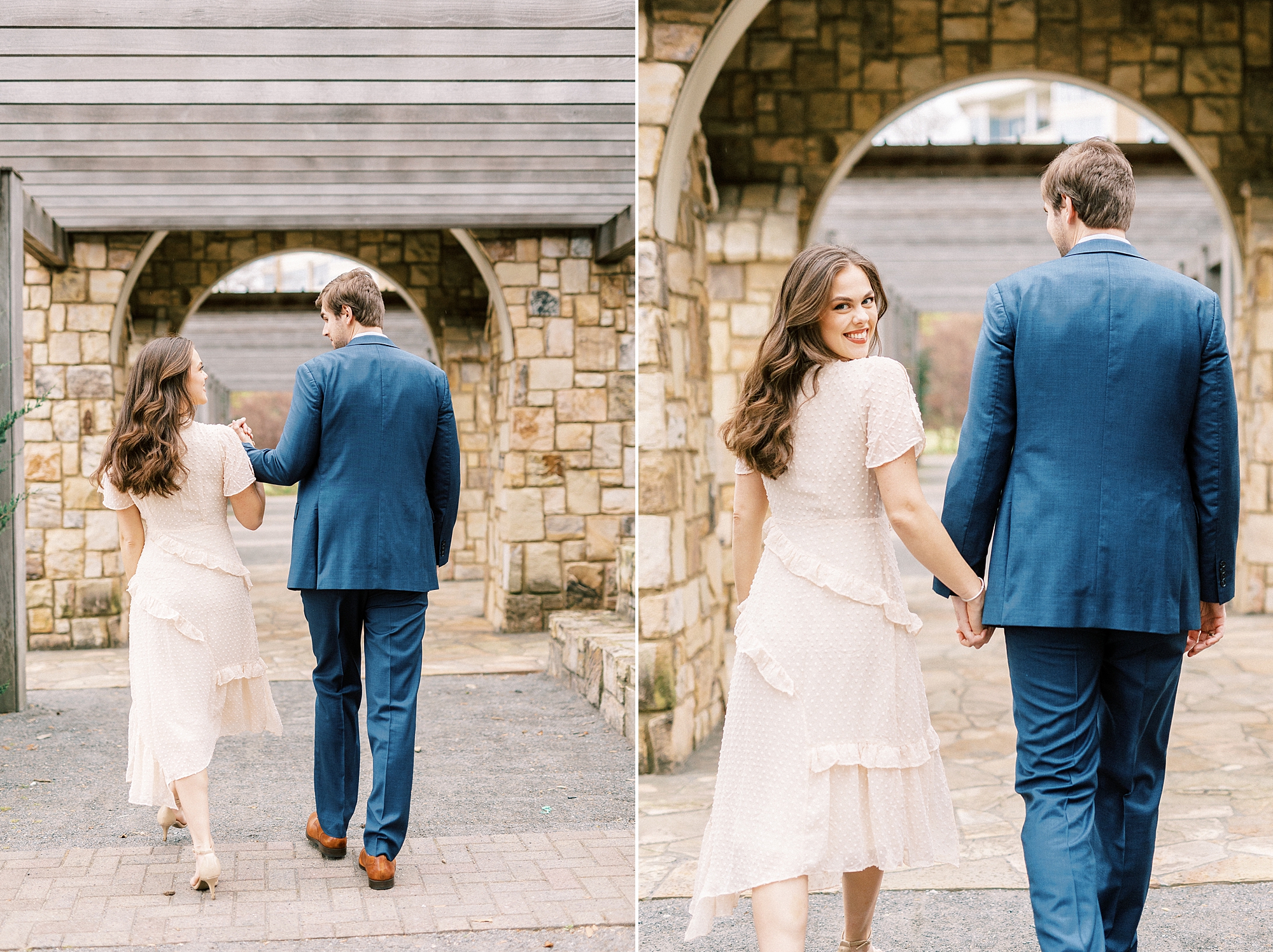 couple holds hands walking through stone arbor at Midtown Park