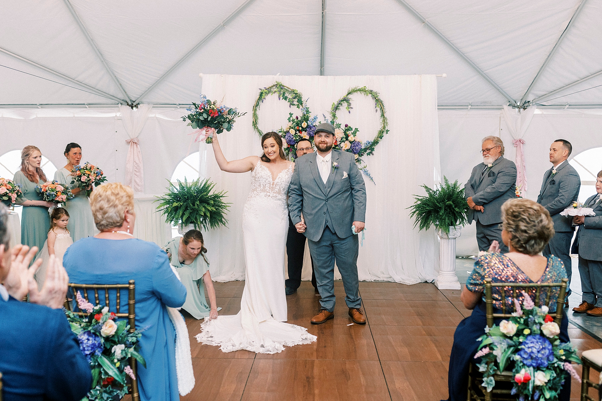 newlyweds cheer after wedding ceremony at The Saratoga Springs