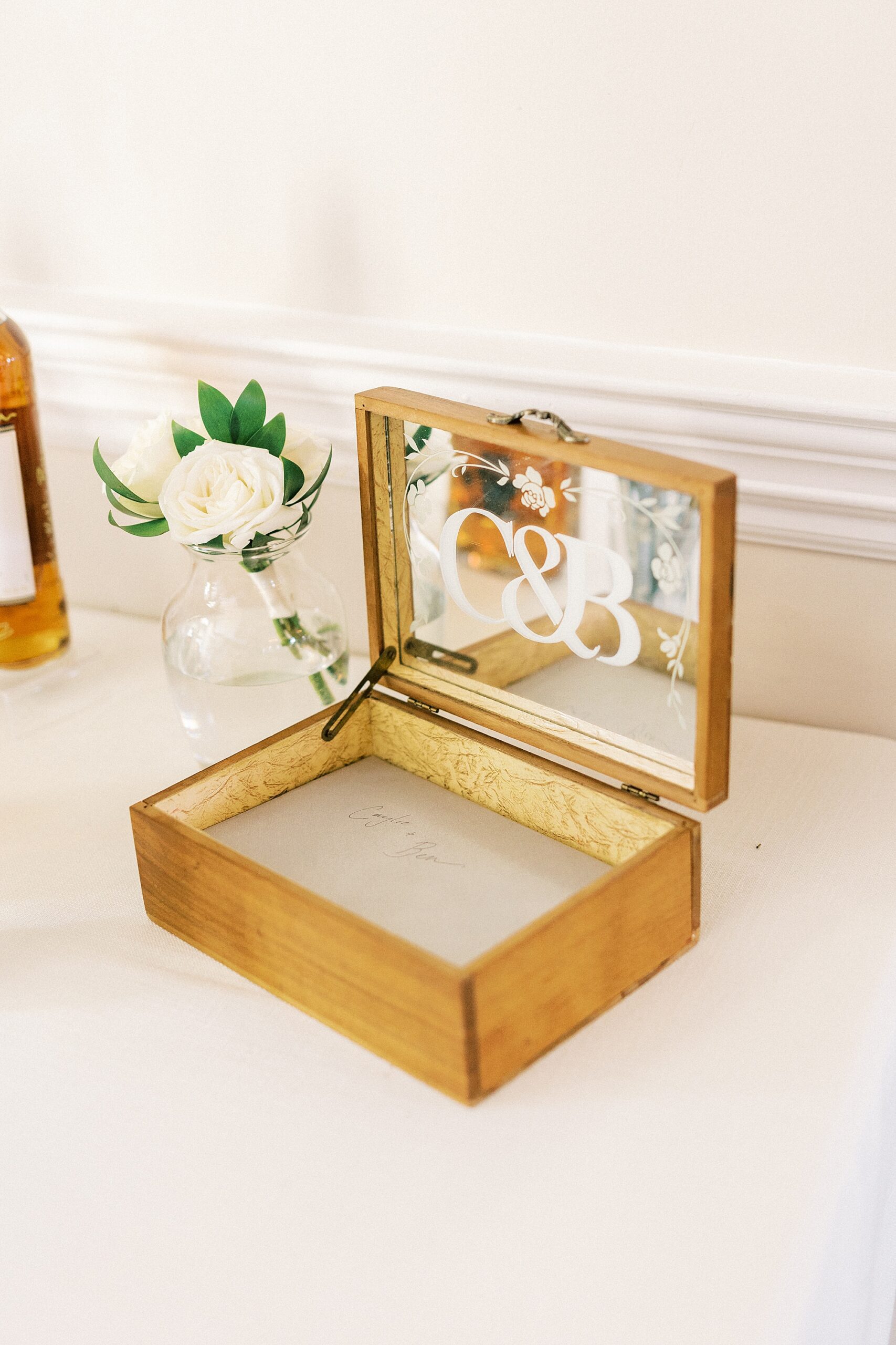 wooden box with C&B on lid 
