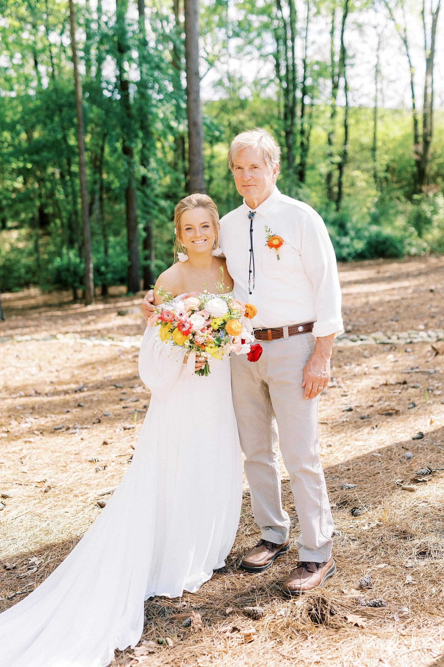 bride hugs dad during first look on lawn of Richfield NC home