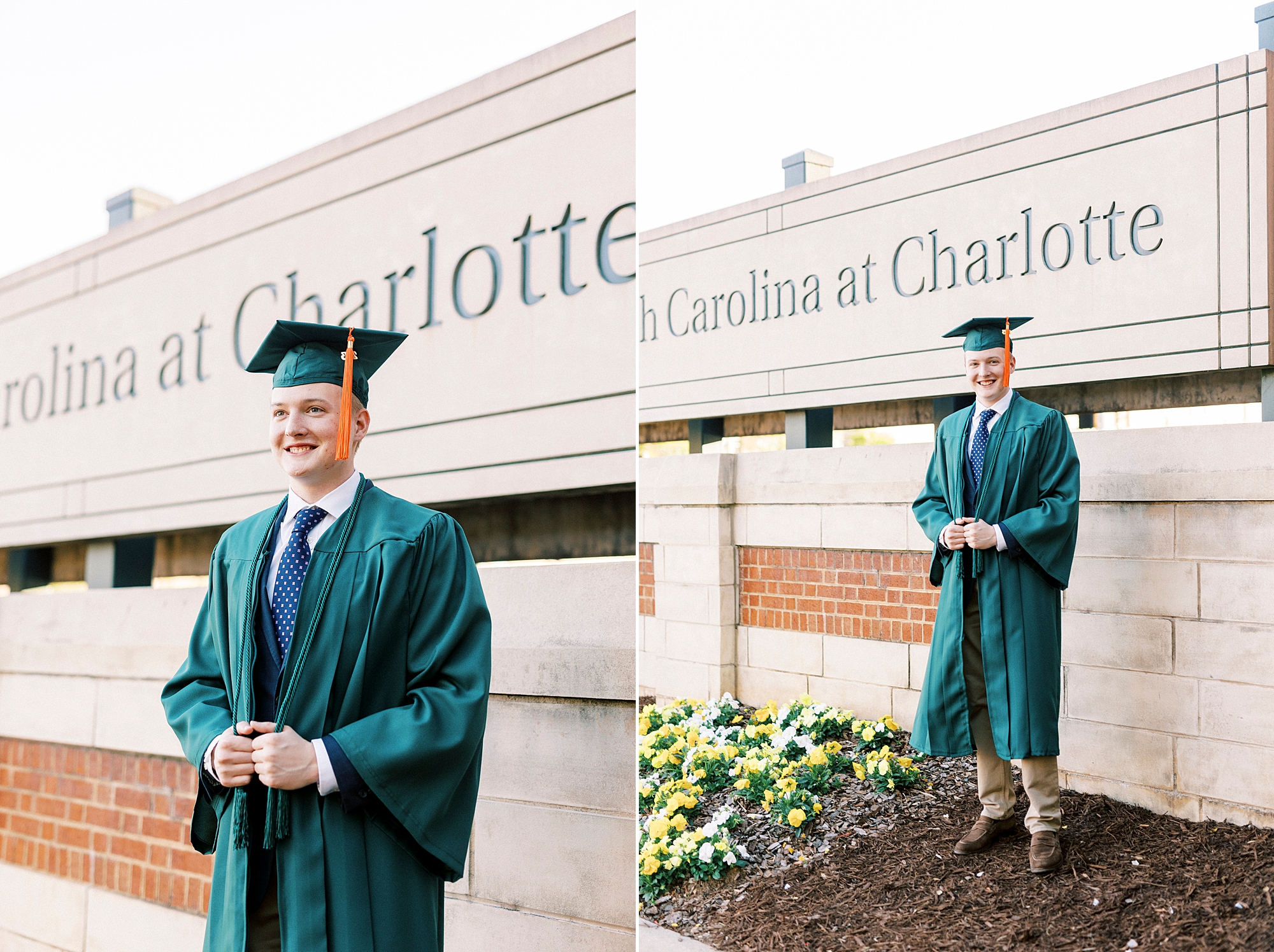 senior in green cap and gown poses near University of North Carolina at Charlotte sign