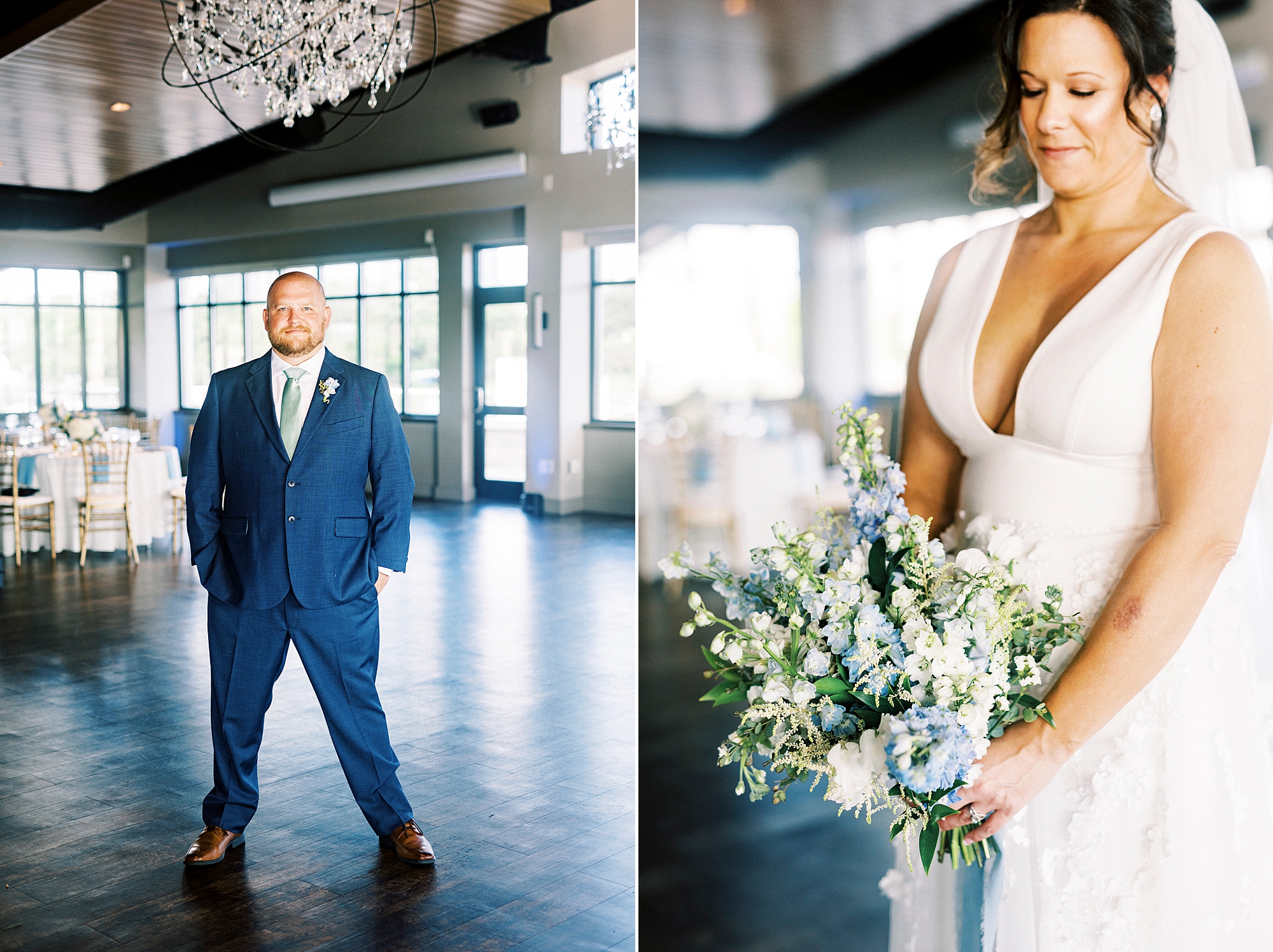 groom in navy suit stands inside the Terrace at Cedar Hill next to bride holding bouquet of white and blue flowers