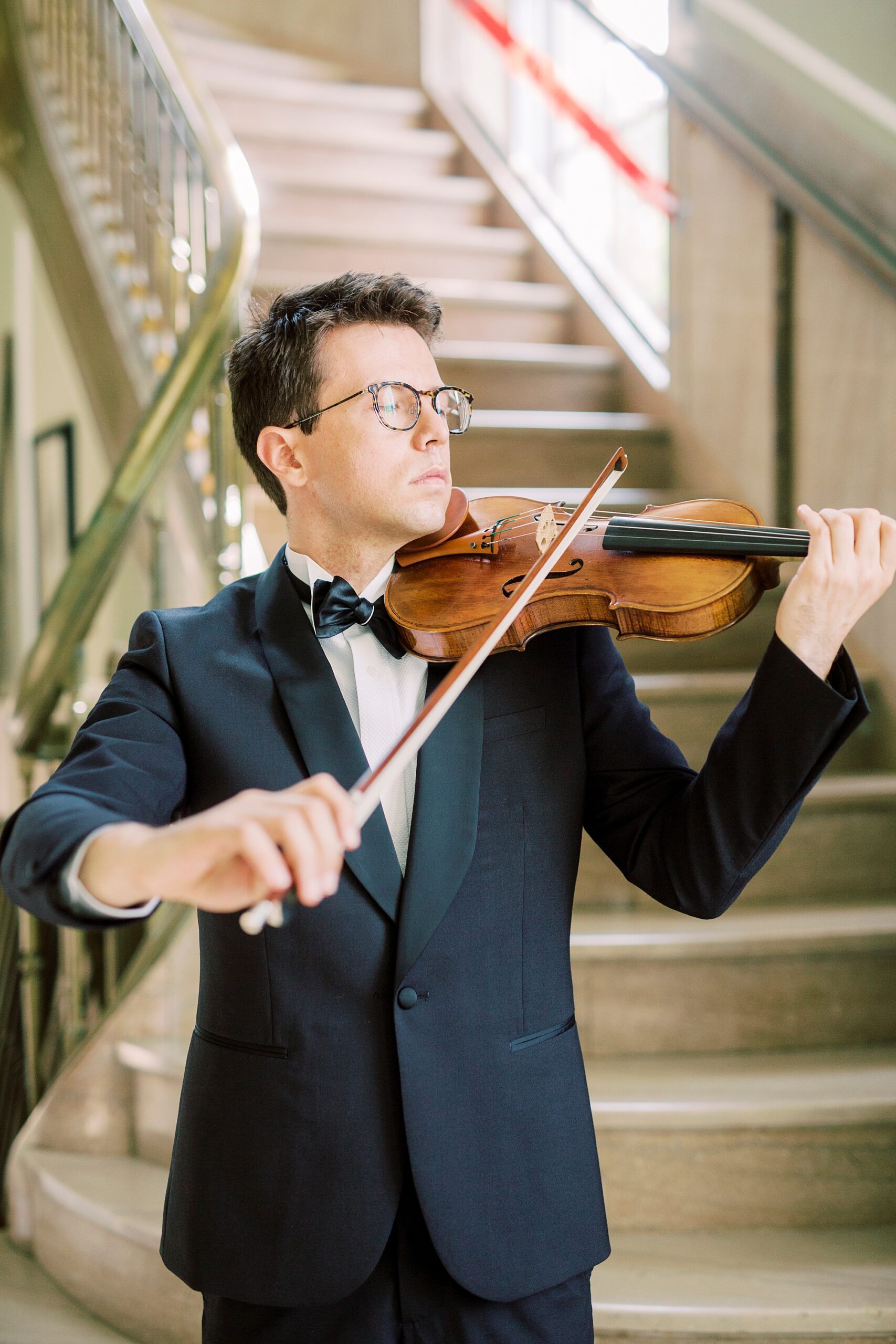 violin player performs near steps in Rock Hill SC