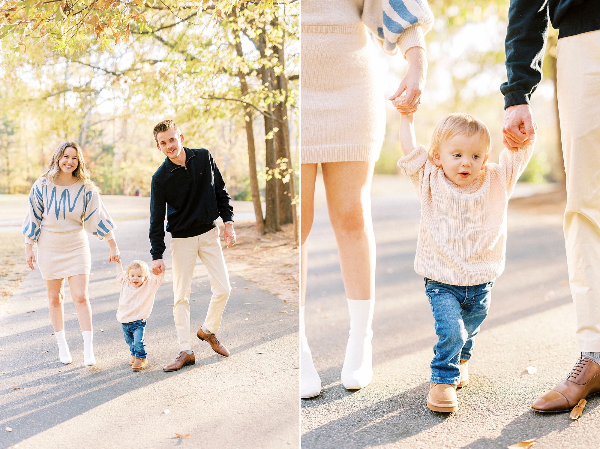 couple holds son's hands helping him walk in path in park 