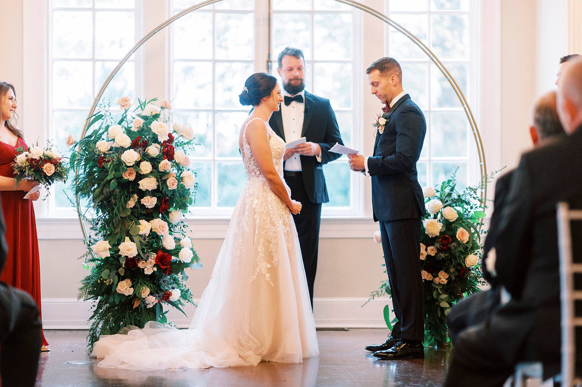 newlyweds exchange vows during winter wedding ceremony at Separk Mansion