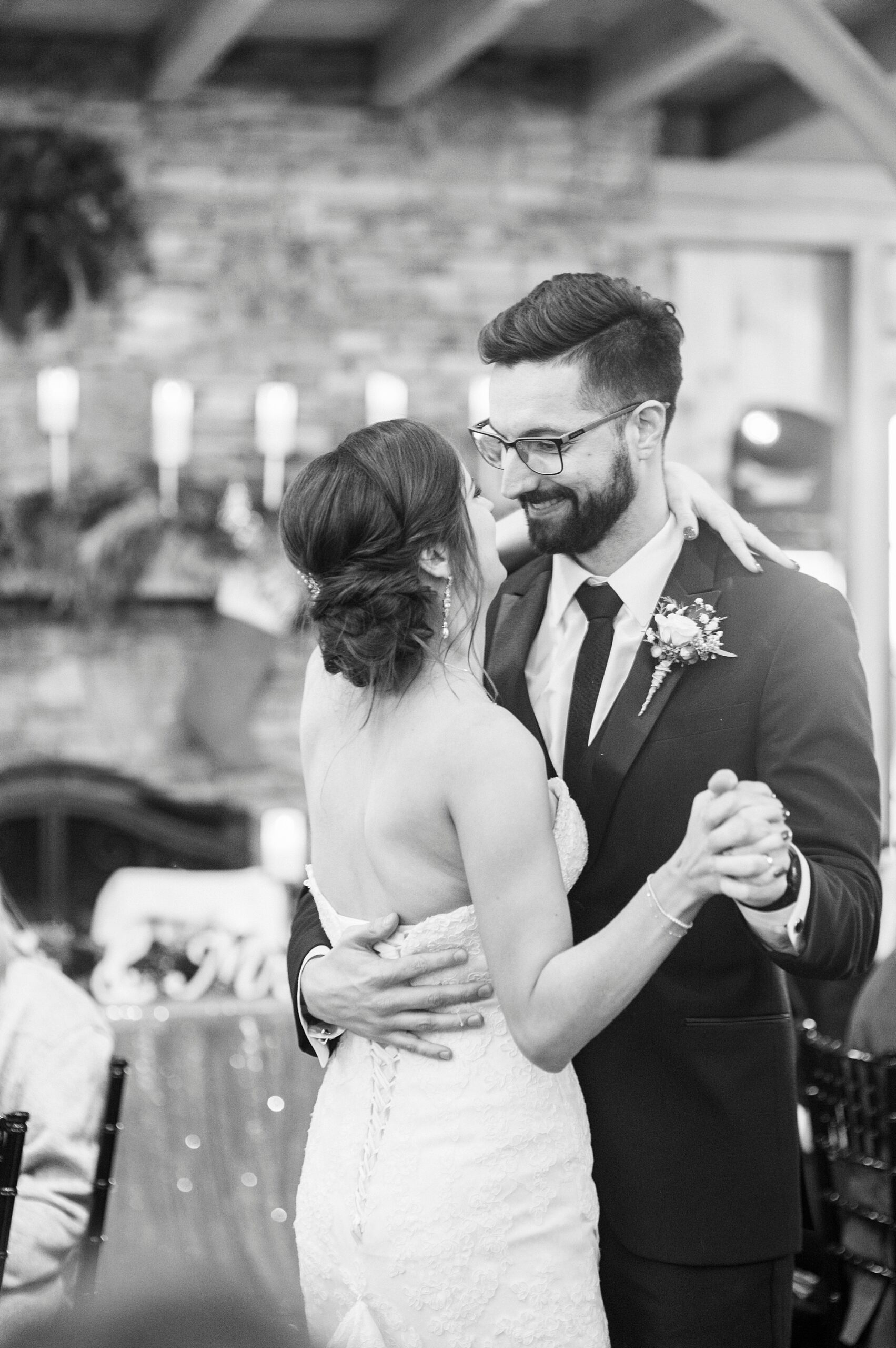 newlyweds dance during reception at Chickadee Hill Farms