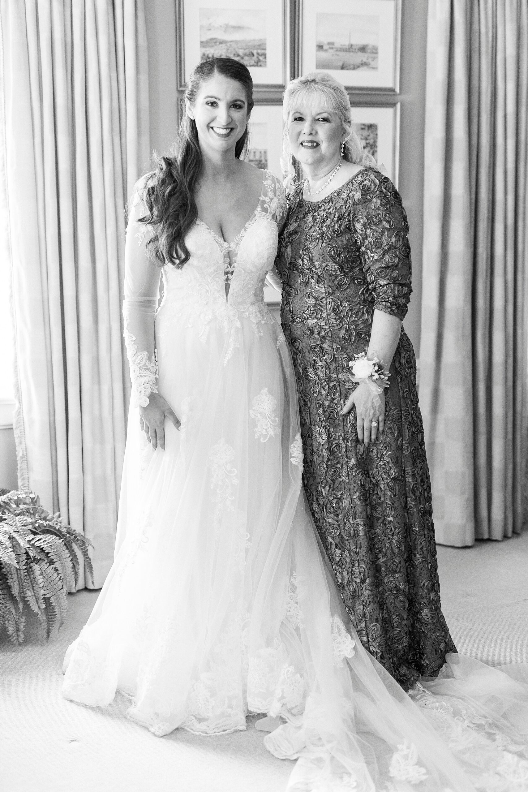 bride and mother hug inside NC home after prepping for wedding