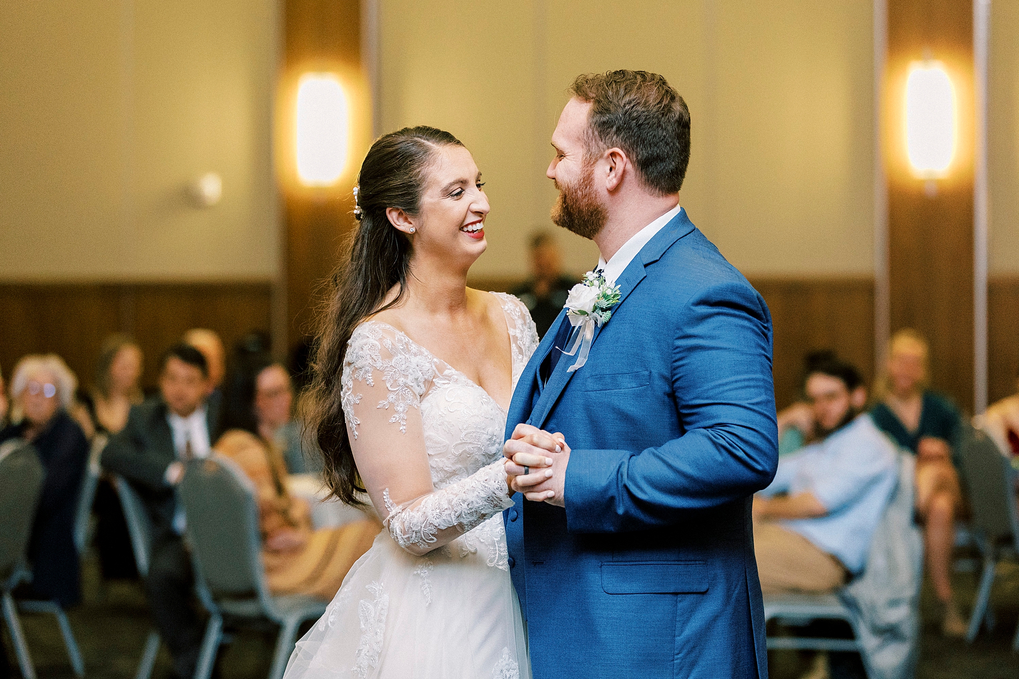 bride and groom dance together during NC wedding reception