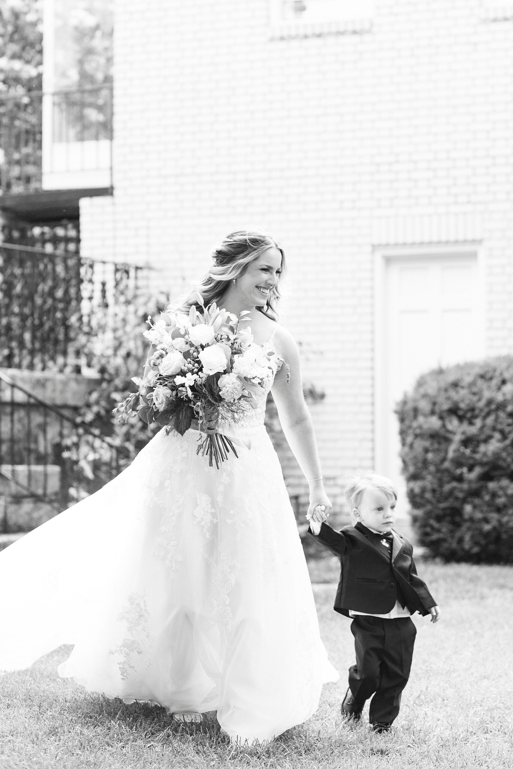 bride walks down aisle with son at Separk Mansion