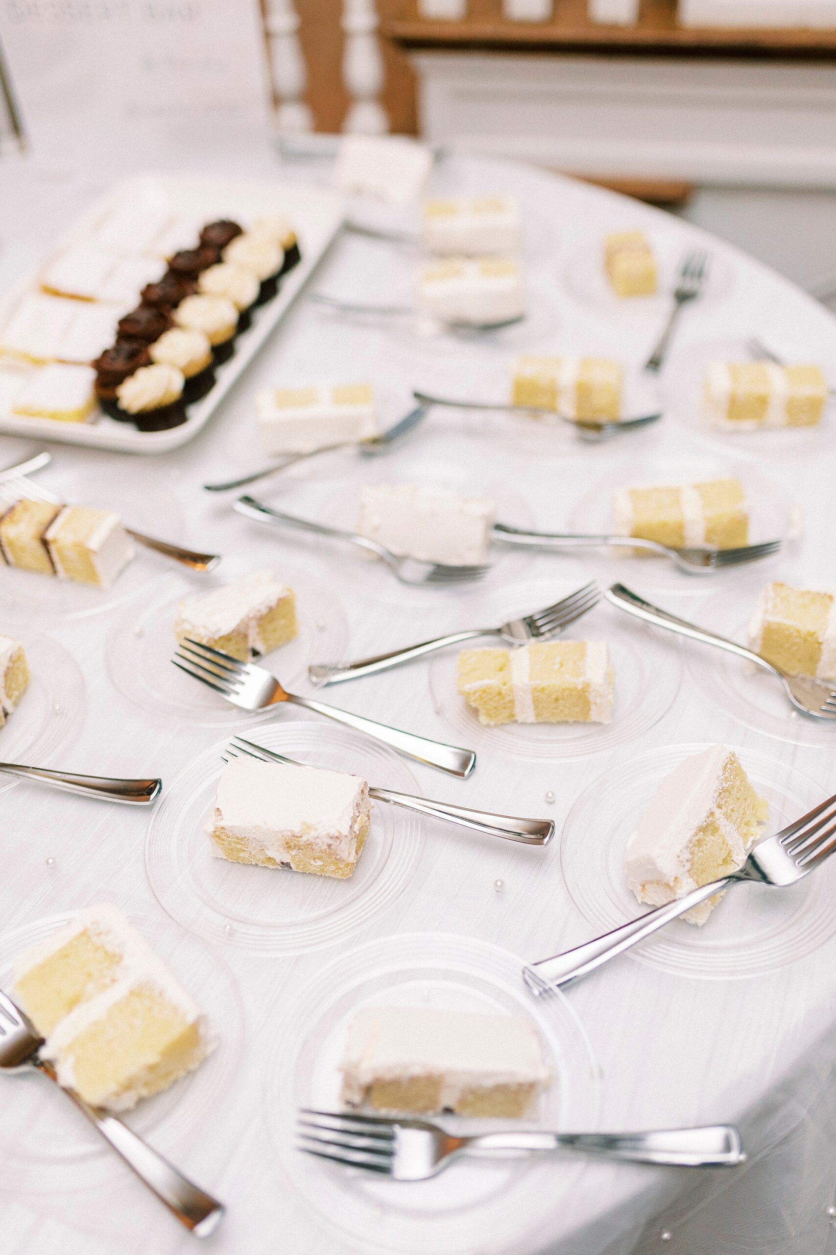 wedding cake slices on dessert table 