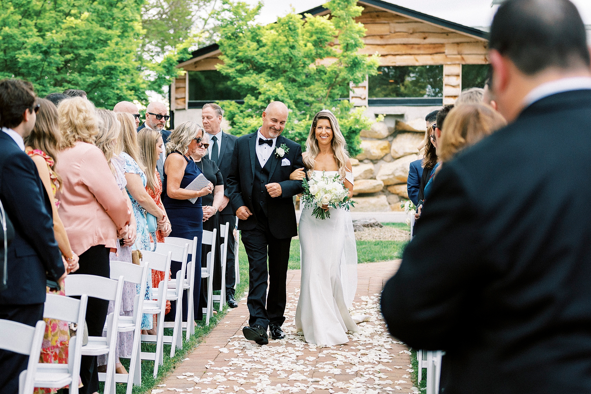 father walks bride down aisle for ceremony at the Venues at Langtree