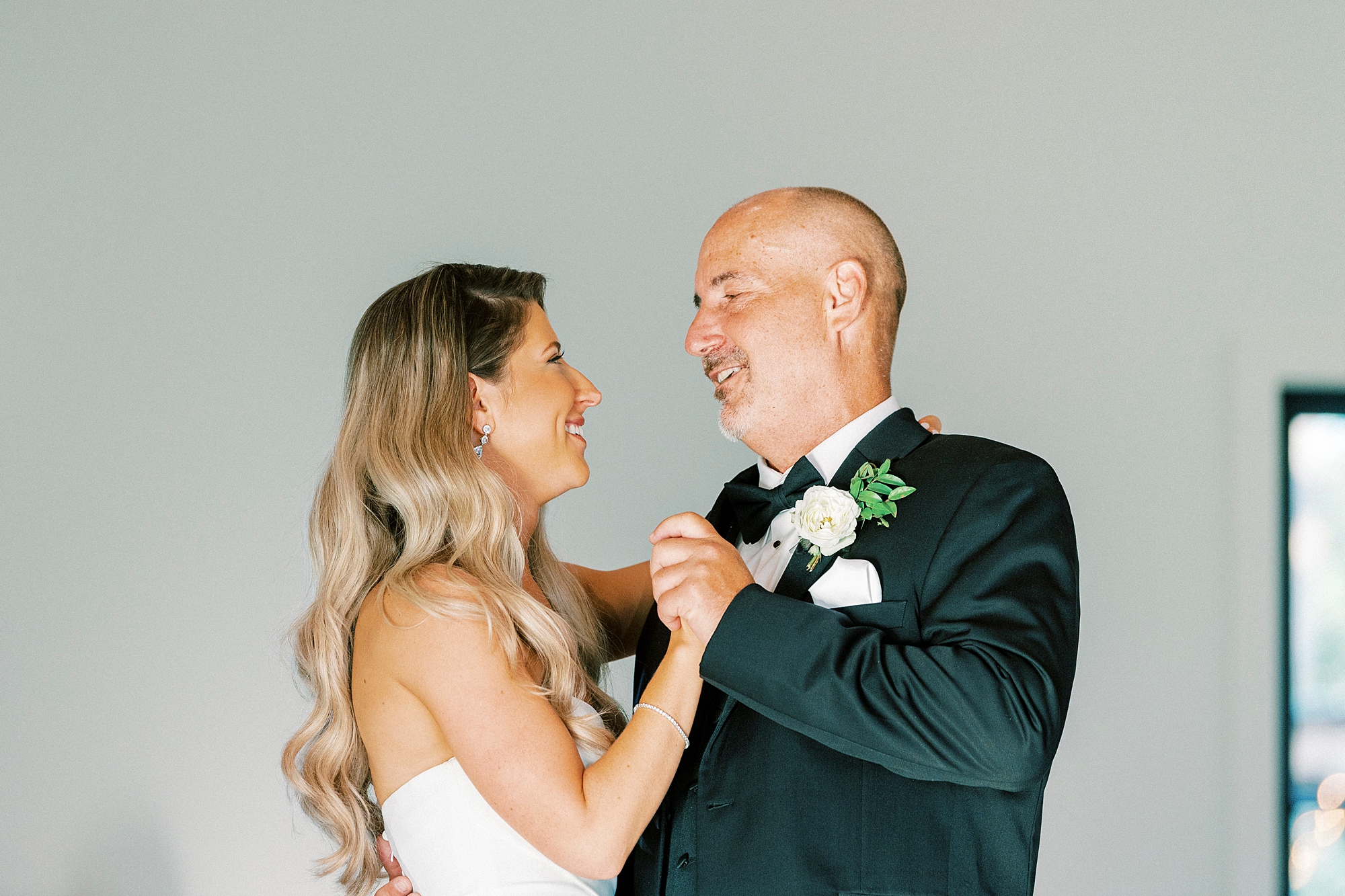 bride and dances with dad during NC wedding reception