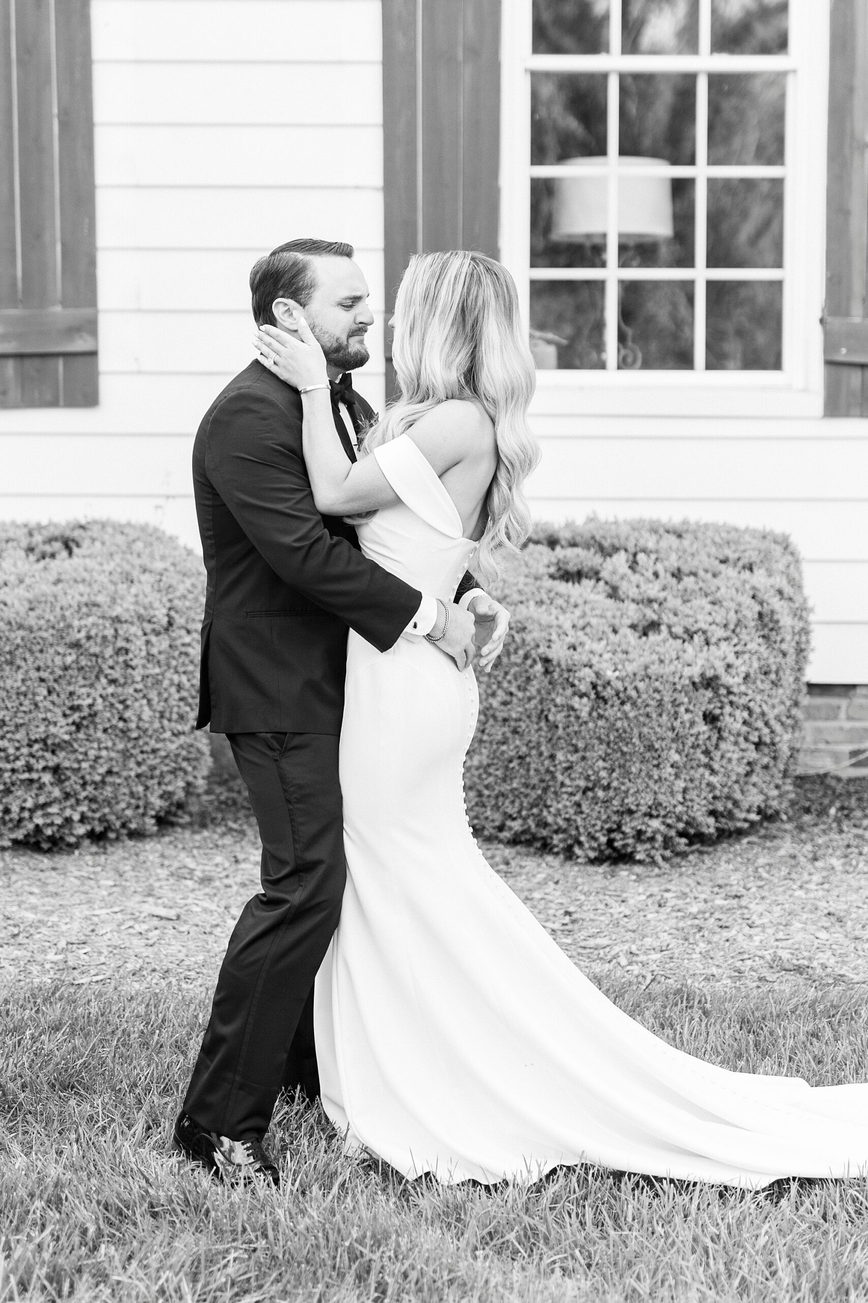 bride and groom hug during first look at the Venues at Langtree
