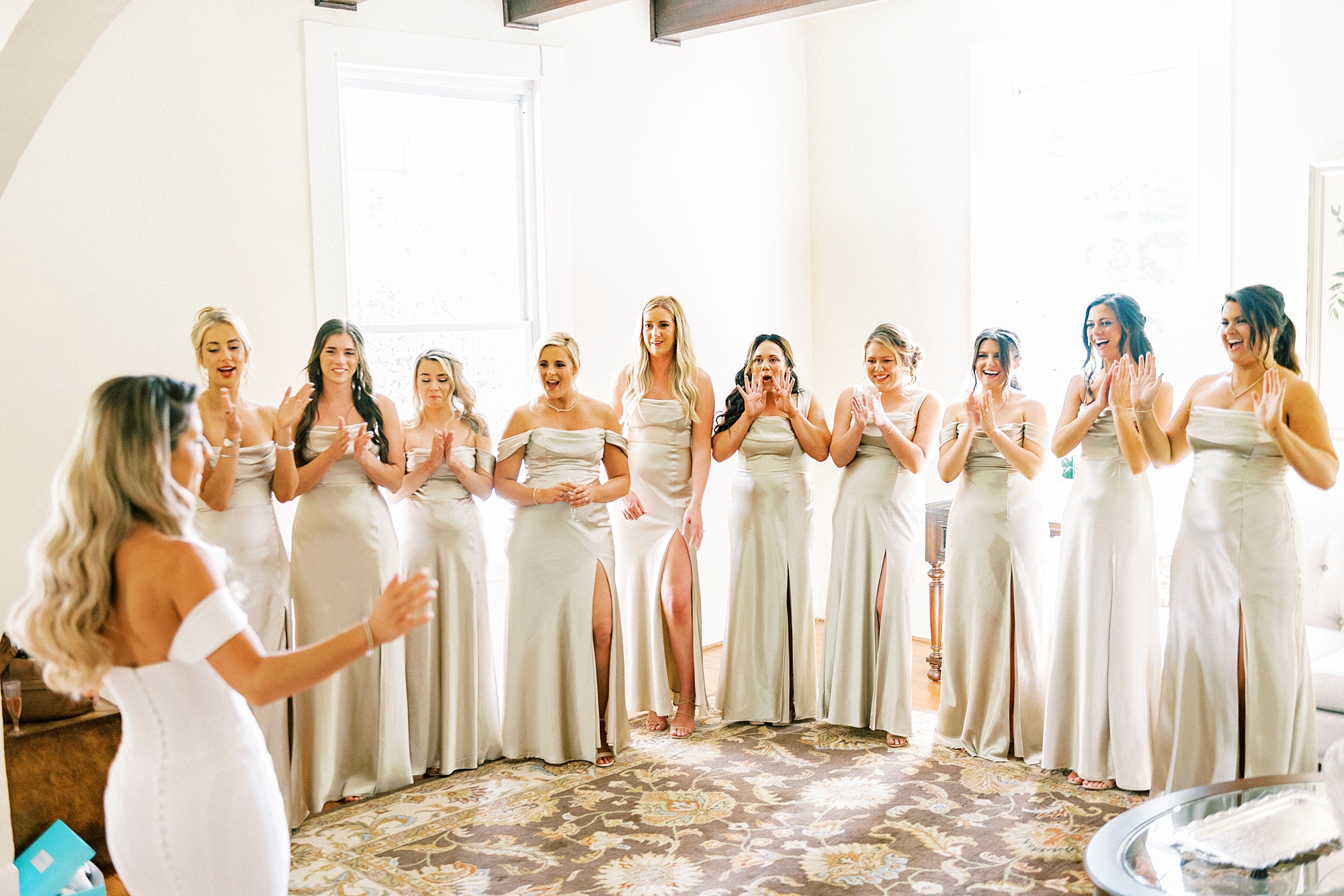 bridesmaids react to seeing bride during first look at the Venues at Langtree