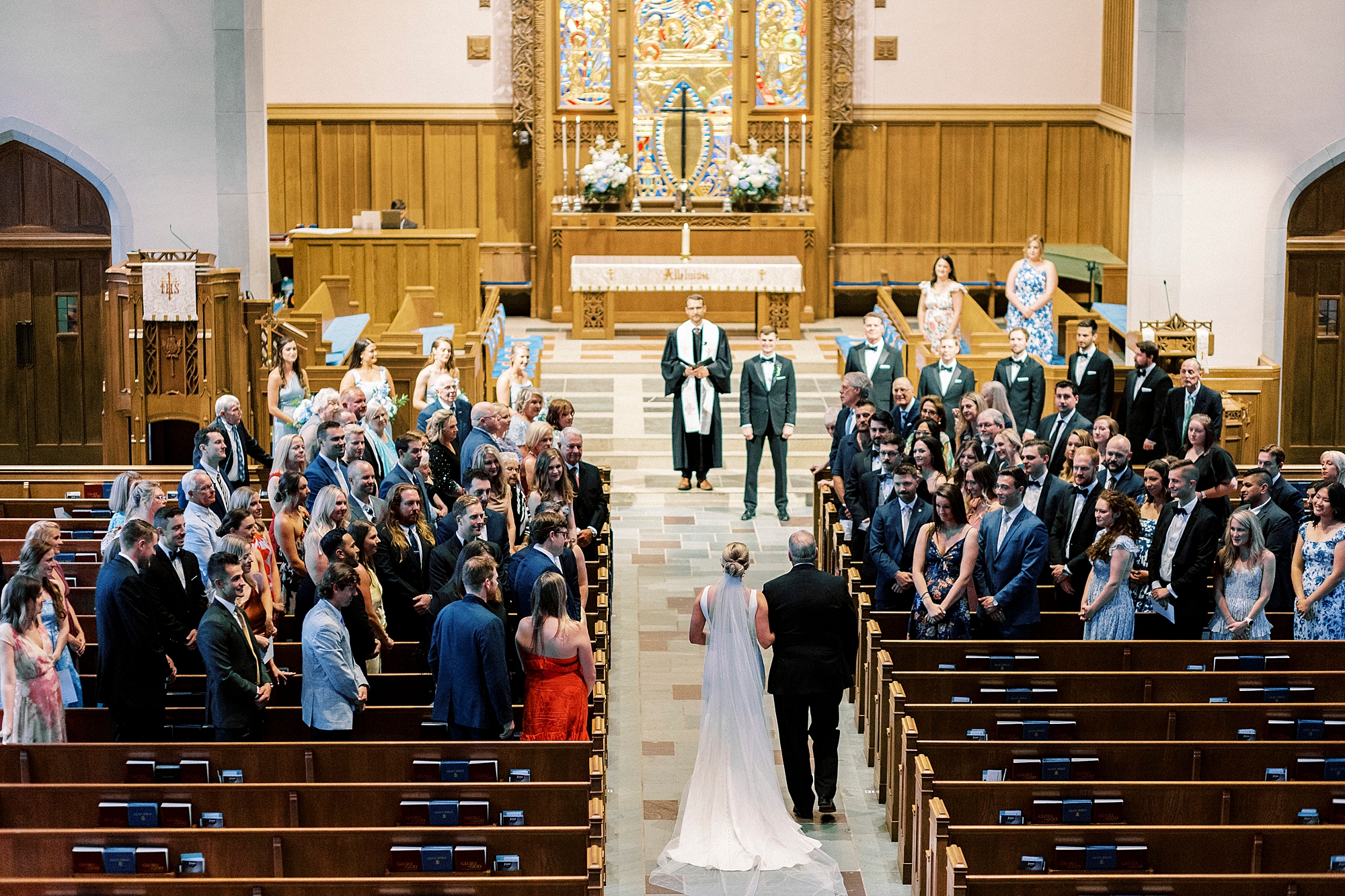 bride walks down aisle with father at Myers Presbyterian Church