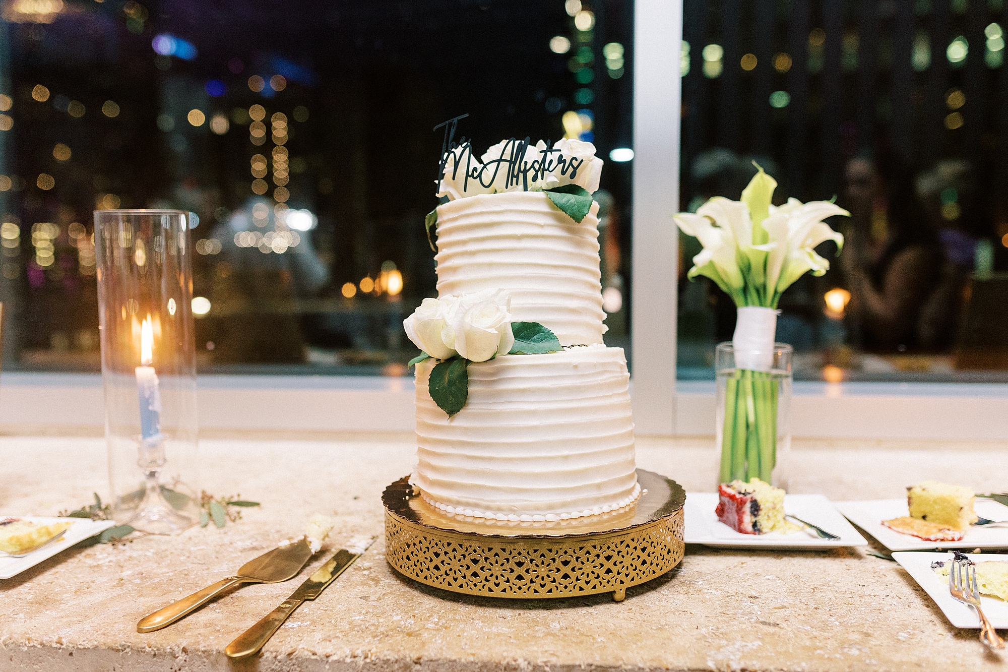 tiered wedding cake with flowers on each layer